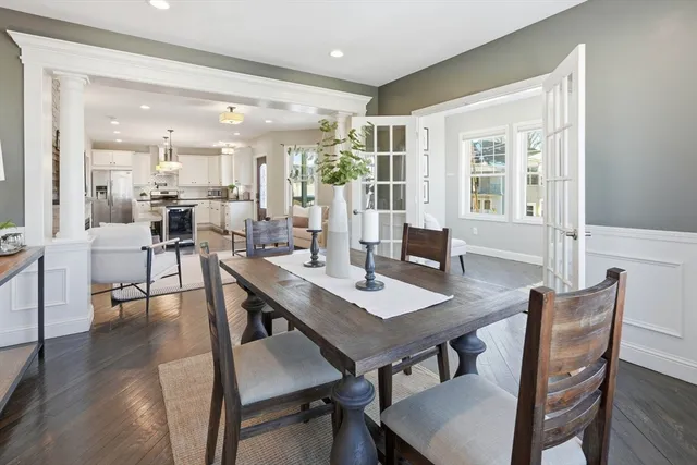 a view of a livingroom with furniture and a window