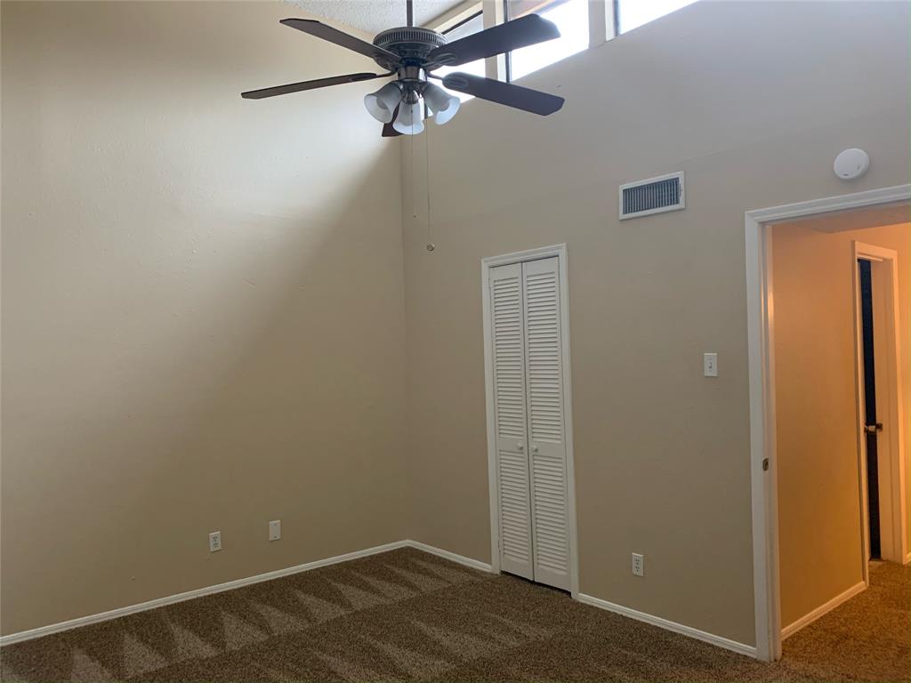 3121 Rosedale Avenue University Park, TX 75205 - Photo 12 of 16 Bedroom with a vaulted ceiling, a contemporary ceiling fan including light fixture.
