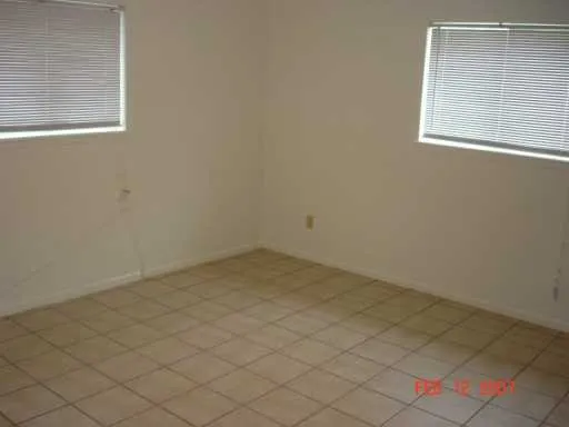 en empty room with windows