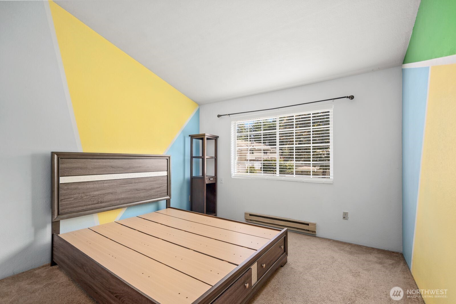 2100 South 336th Street, Unit G3 Federal Way, WA 98003 - Photo 19 of 27 a room with a bed and a window