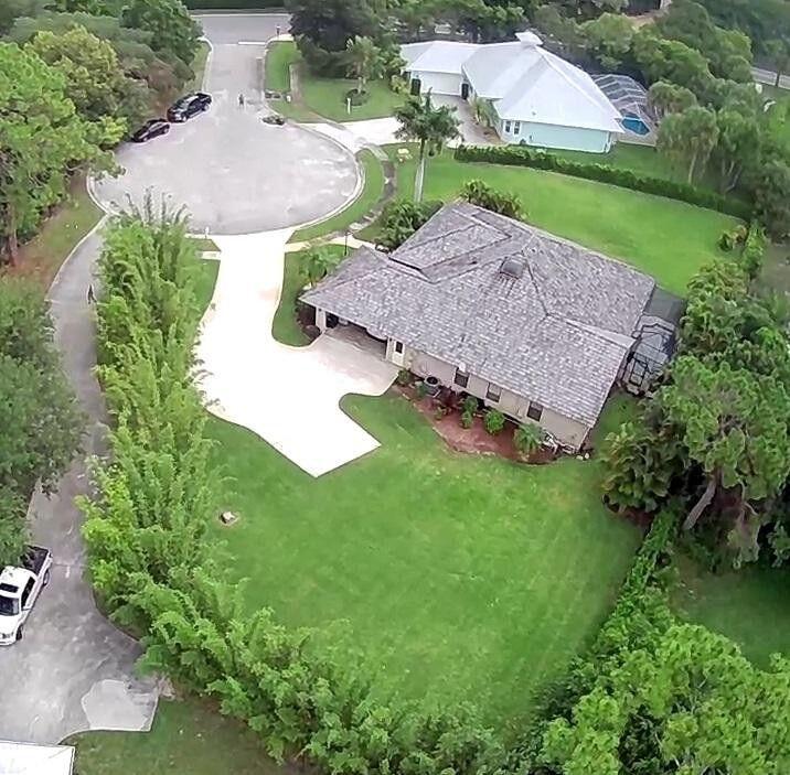 6118 Creekside Trail Jupiter, FL 33458 - Photo 12 of 17 6118 creekside Aireol w side