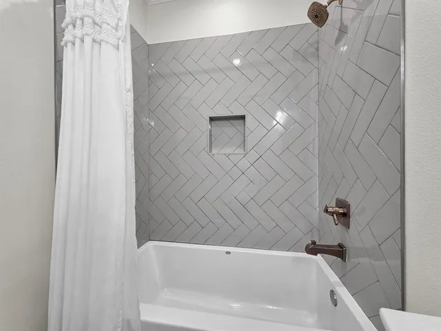 a bathroom with a bathtub