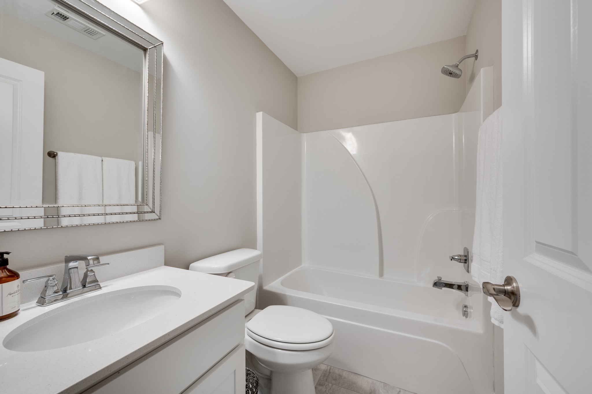 3106 Patcham Drive Nolensville, TN 37135 - Photo 16 of 27 a bathroom with a sink toilet vanity and shower