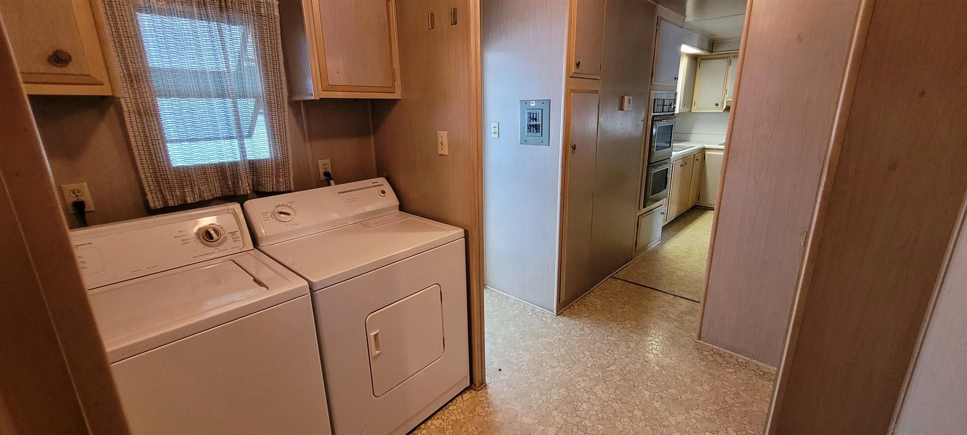 13644 Marigold Drive, Unit 176 Poway, CA 92064 - Photo 11 of 11 a utility room with dryer and washer