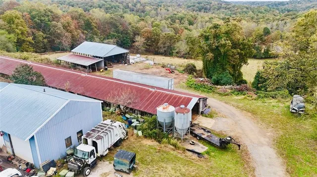 a view of house with outdoor seating