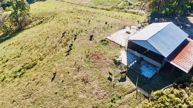 a roof deck with table and chairs