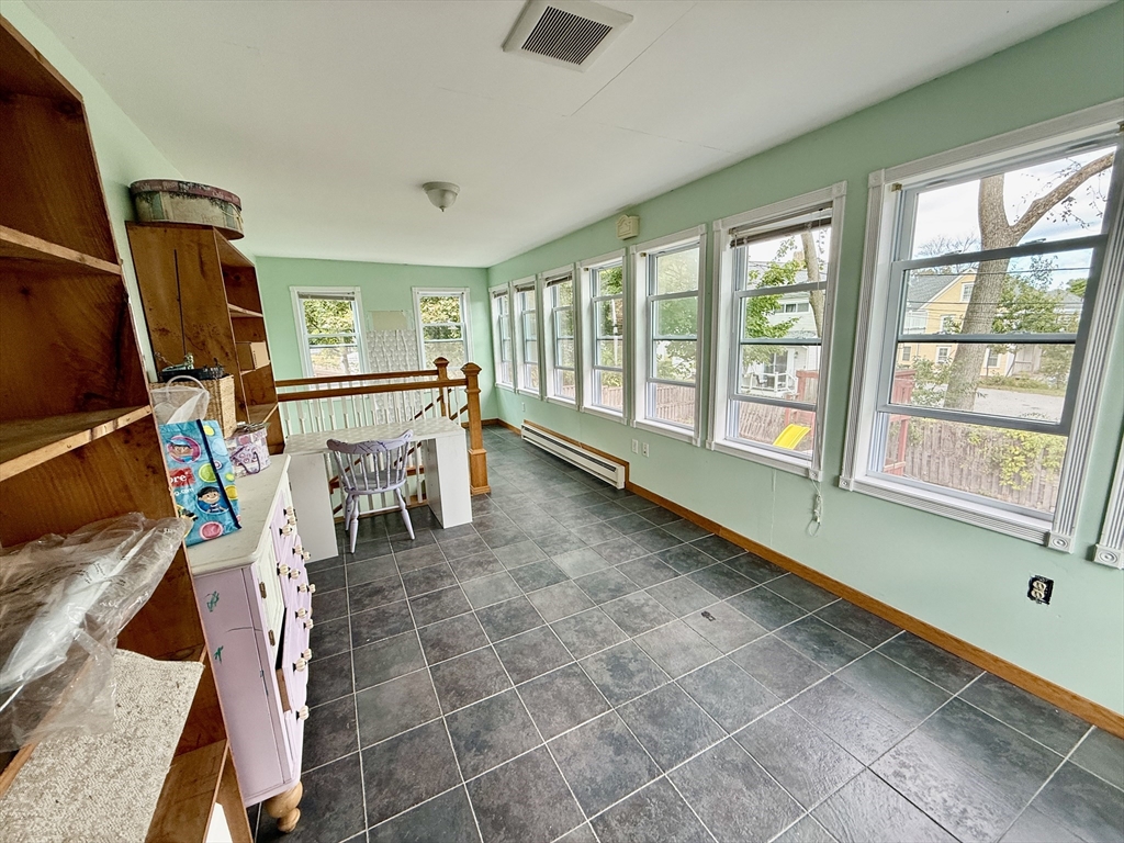 22 Baker Street Worcester, MA 01603 - Photo 14 of 35 a very nice looking room with a large window