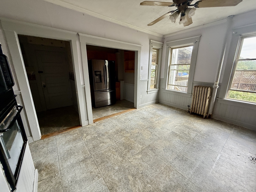 22 Baker Street Worcester, MA 01603 - Photo 8 of 35 a view of an empty room with a window