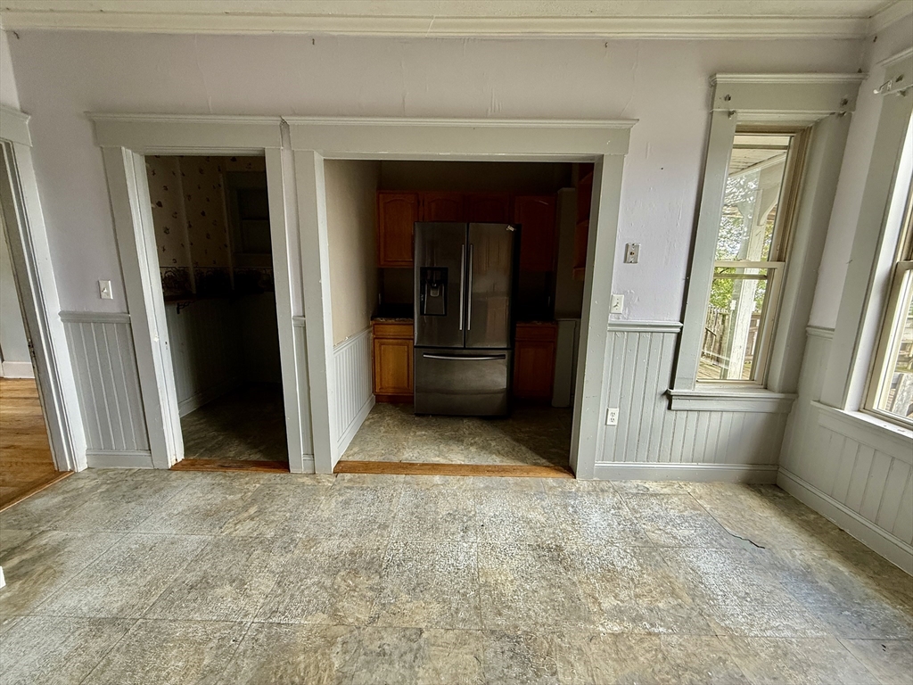 22 Baker Street Worcester, MA 01603 - Photo 9 of 35 an empty room with windows