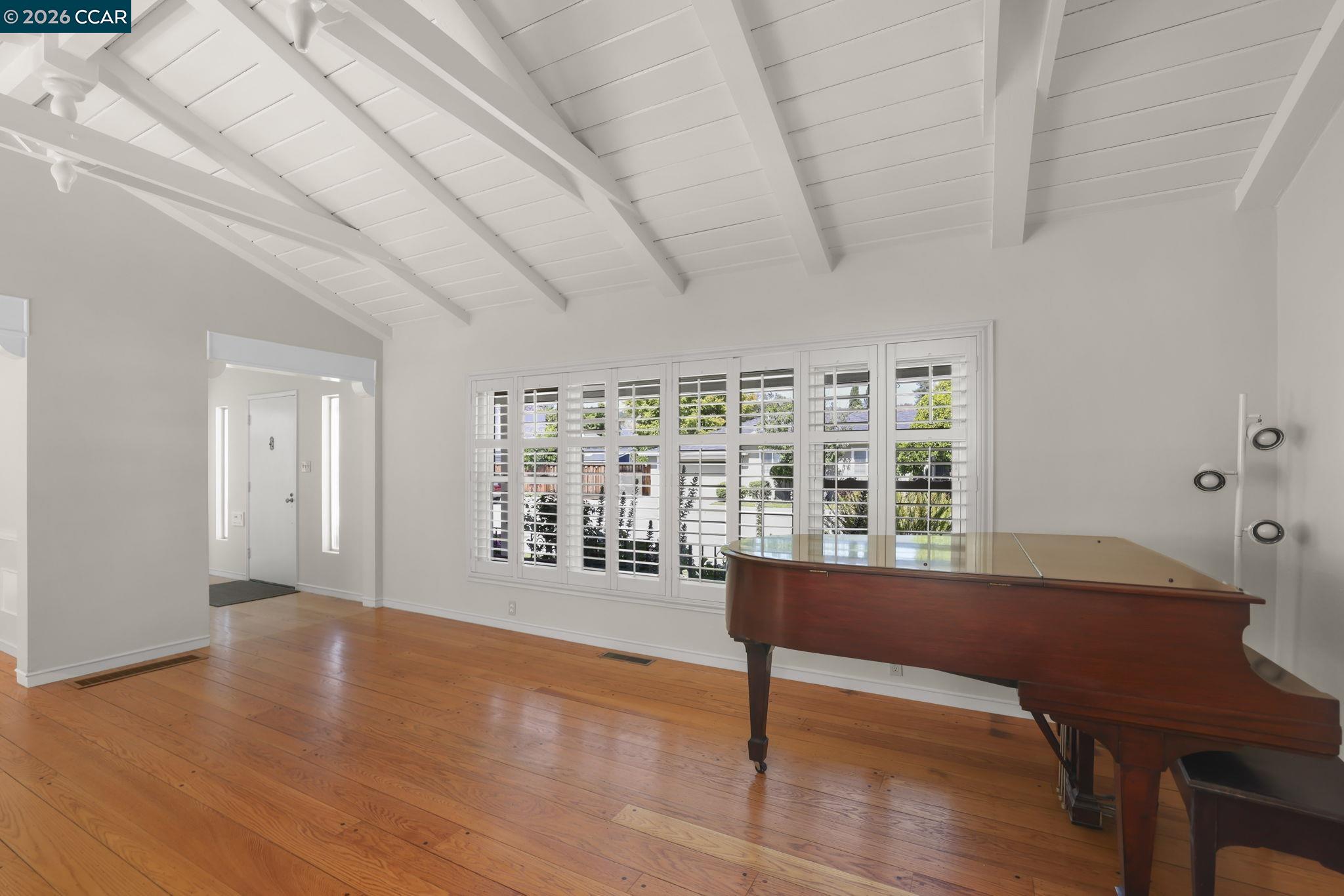 1051 San Rafael Street San Leandro, CA 94577 - Photo 5 of 26 a view of a room with furniture and wooden floor