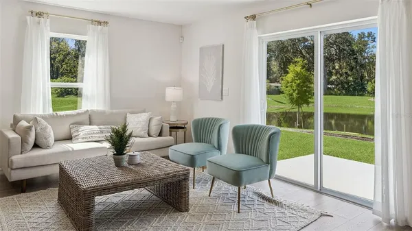 a living room with furniture and a window