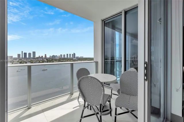 a bedroom with bed and a couch