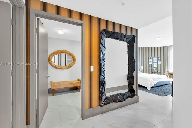 a bathroom with a double vanity sink mirror and shower