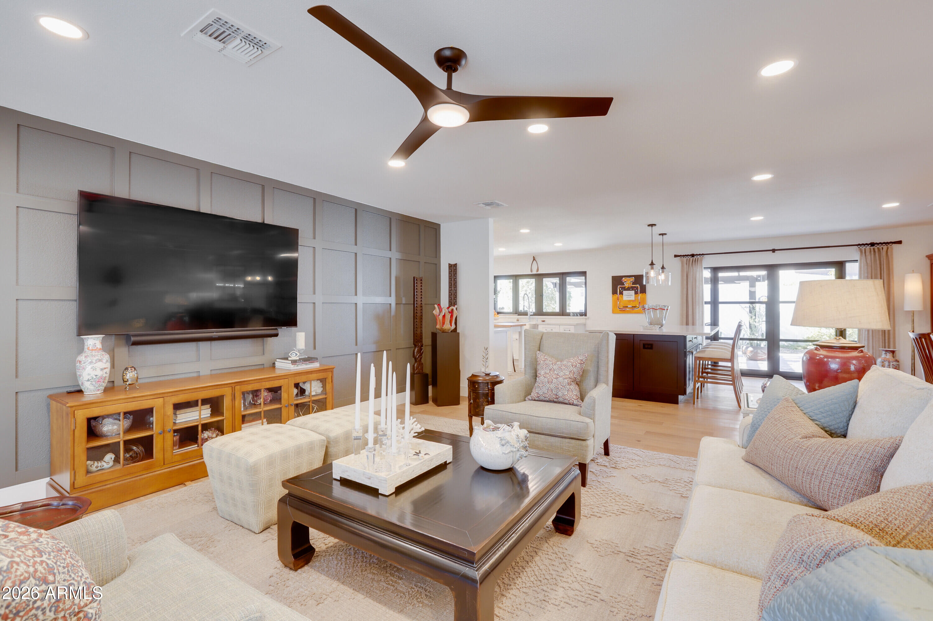 8220 North 1st Avenue Phoenix, AZ 85021 - Photo 11 of 53 a living room with furniture and a flat screen tv