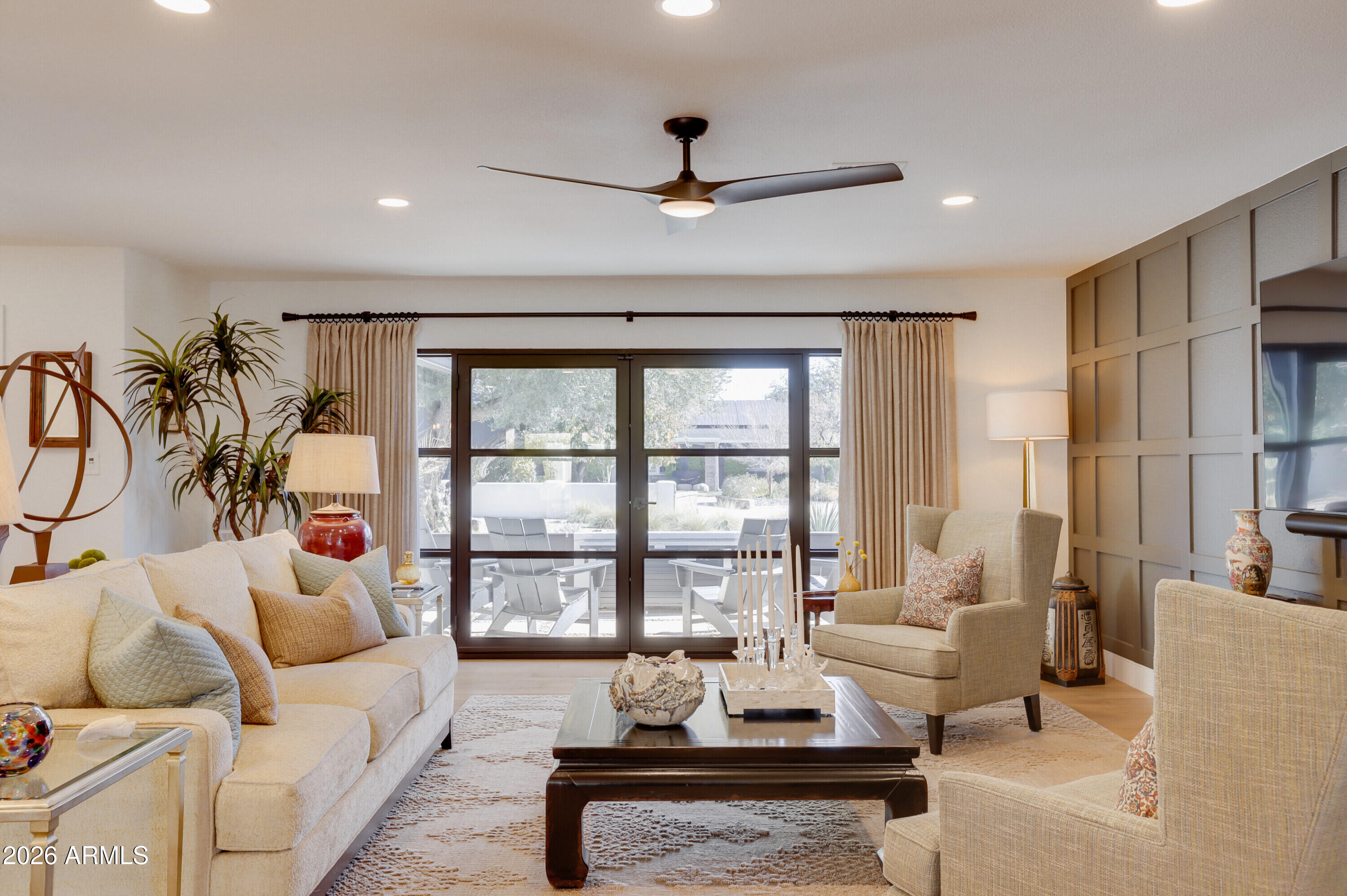 8220 North 1st Avenue Phoenix, AZ 85021 - Photo 13 of 53 a living room with furniture and a large window