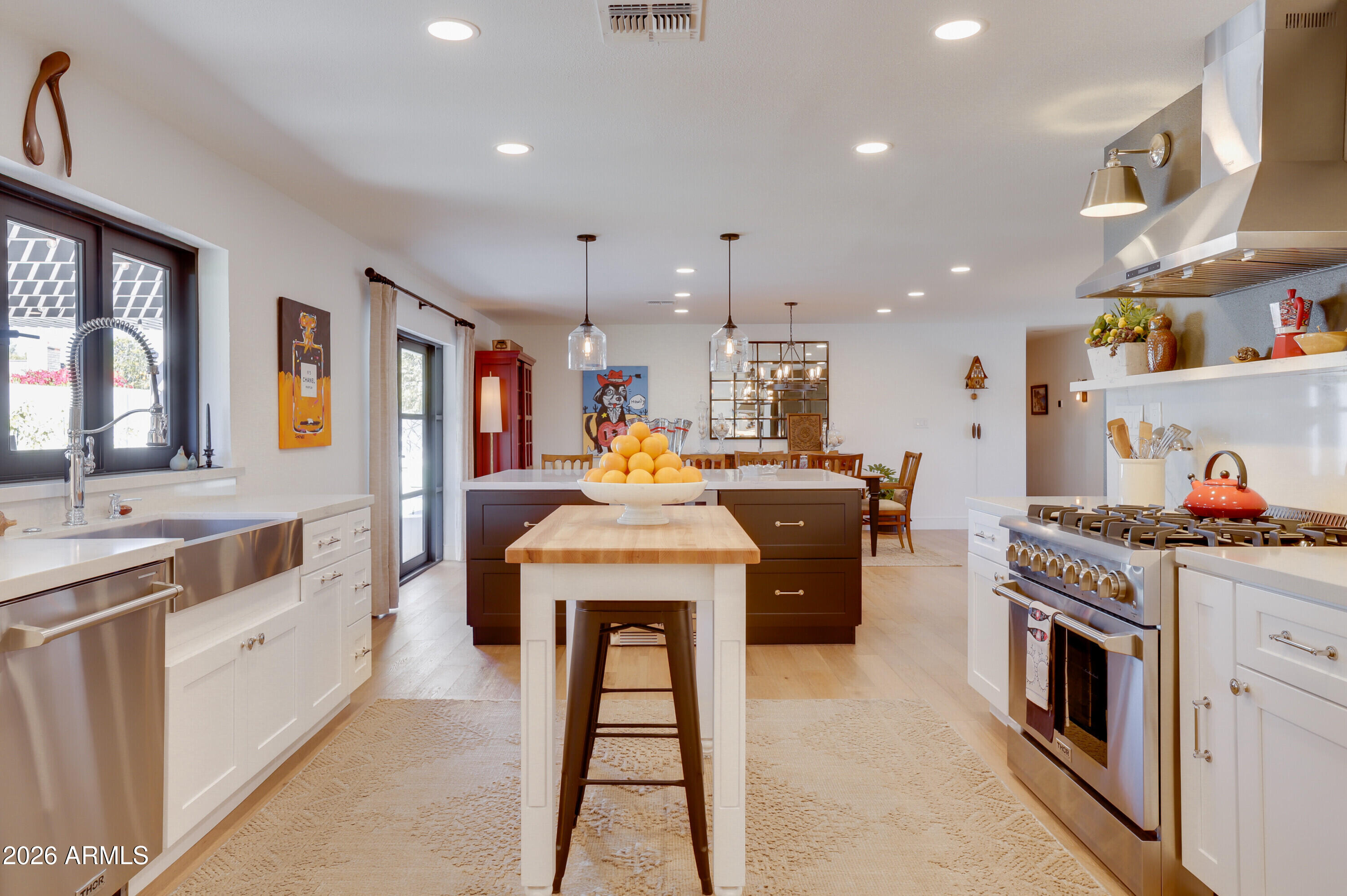 8220 North 1st Avenue Phoenix, AZ 85021 - Photo 19 of 53 a kitchen that has a lot of cabinets in it and appliances