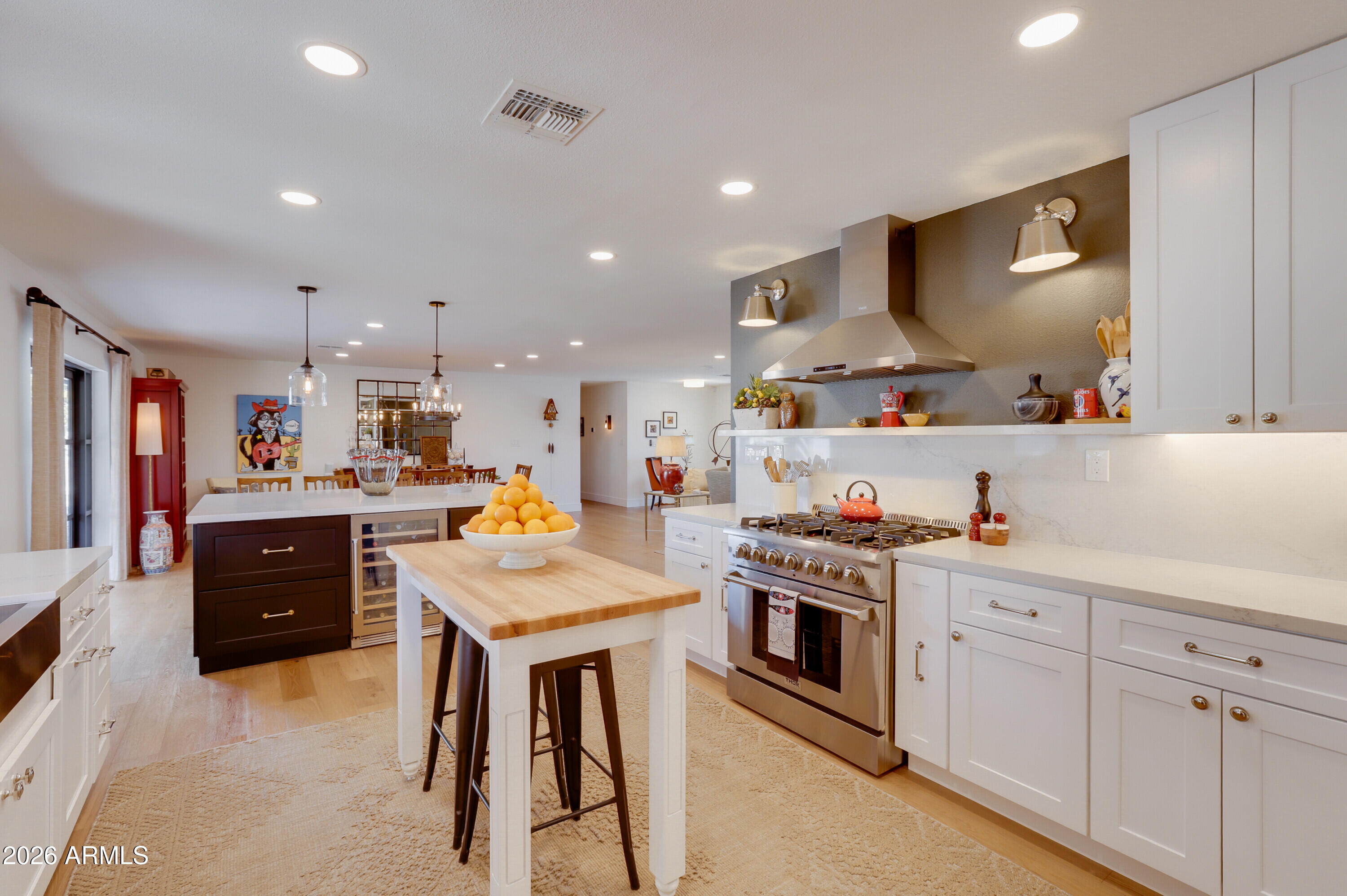 8220 North 1st Avenue Phoenix, AZ 85021 - Photo 20 of 53 a kitchen with white cabinets and white appliances