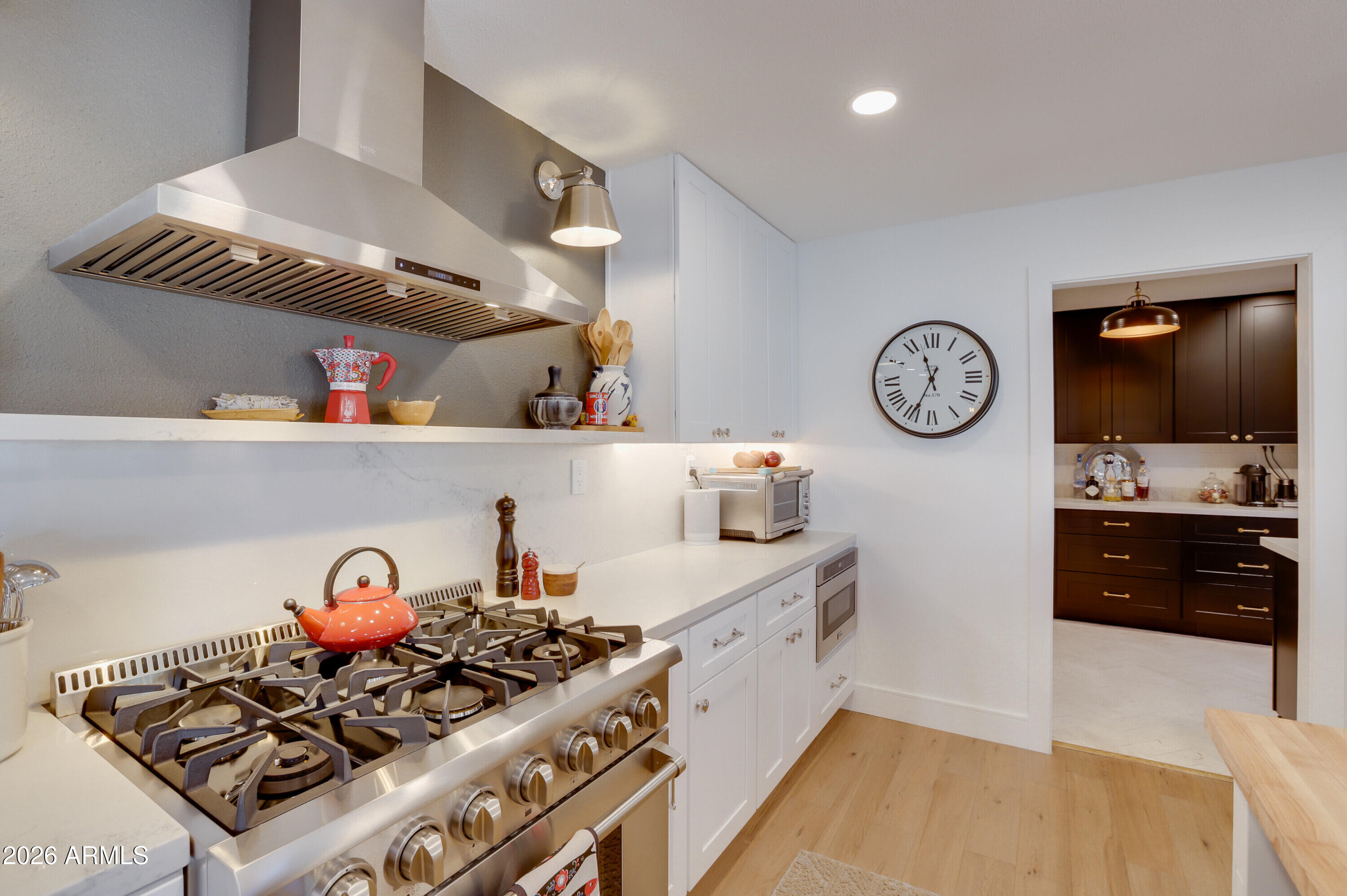8220 North 1st Avenue Phoenix, AZ 85021 - Photo 24 of 53 a kitchen with stainless steel appliances granite countertop a stove and a cabinets