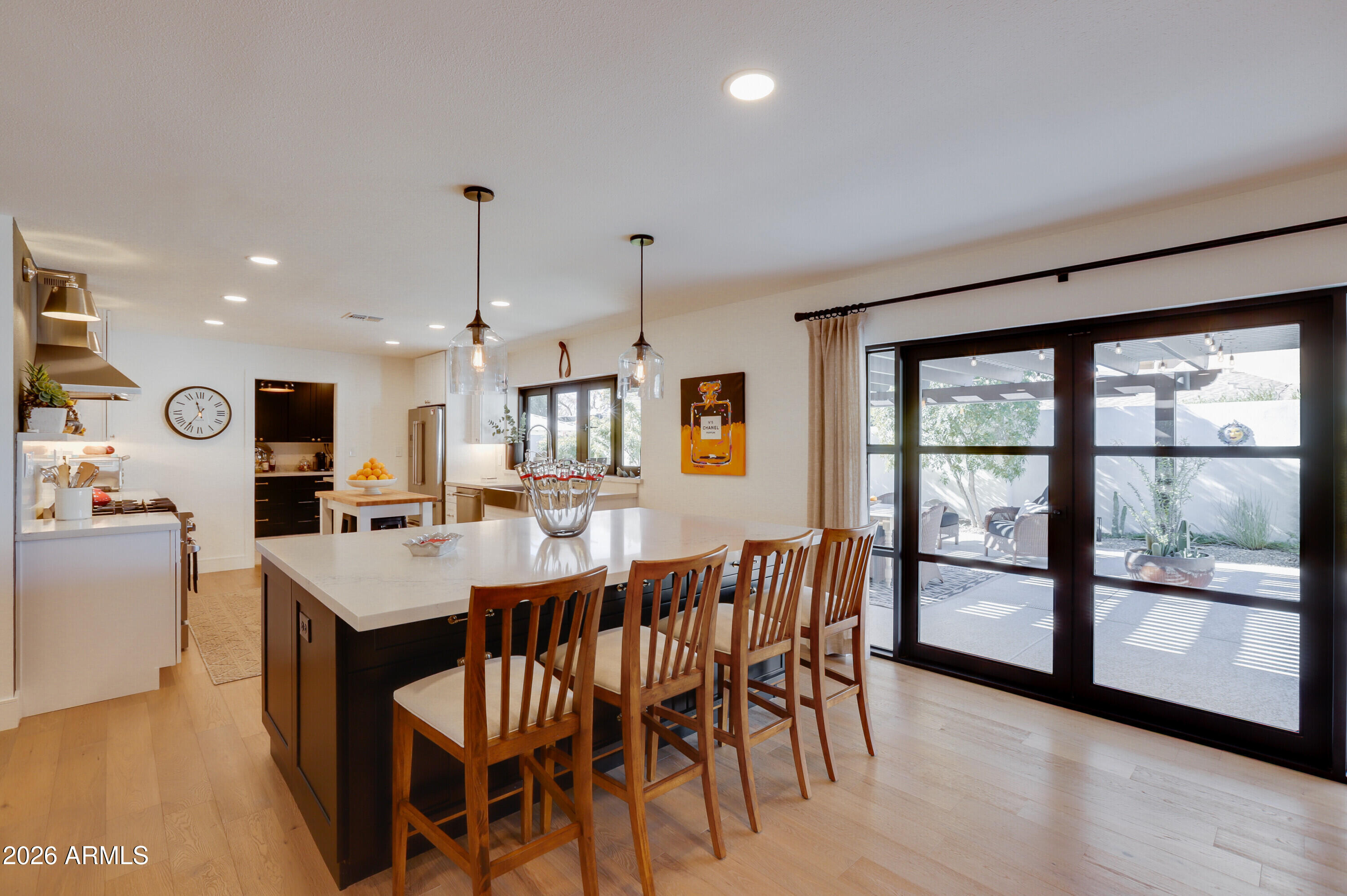8220 North 1st Avenue Phoenix, AZ 85021 - Photo 28 of 53 a large kitchen with a table and chairs