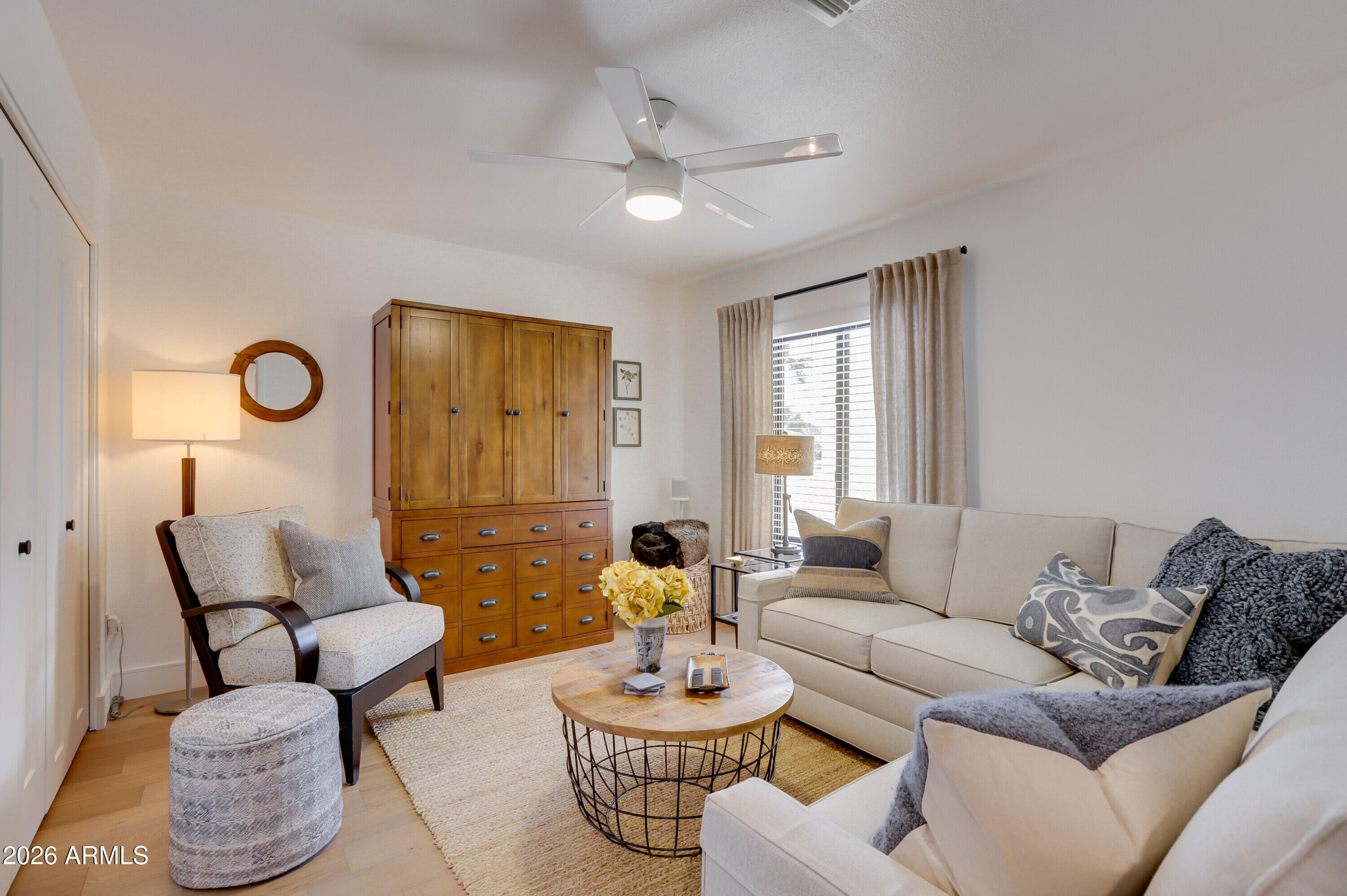 8220 North 1st Avenue Phoenix, AZ 85021 - Photo 30 of 53 a living room with furniture and a large window