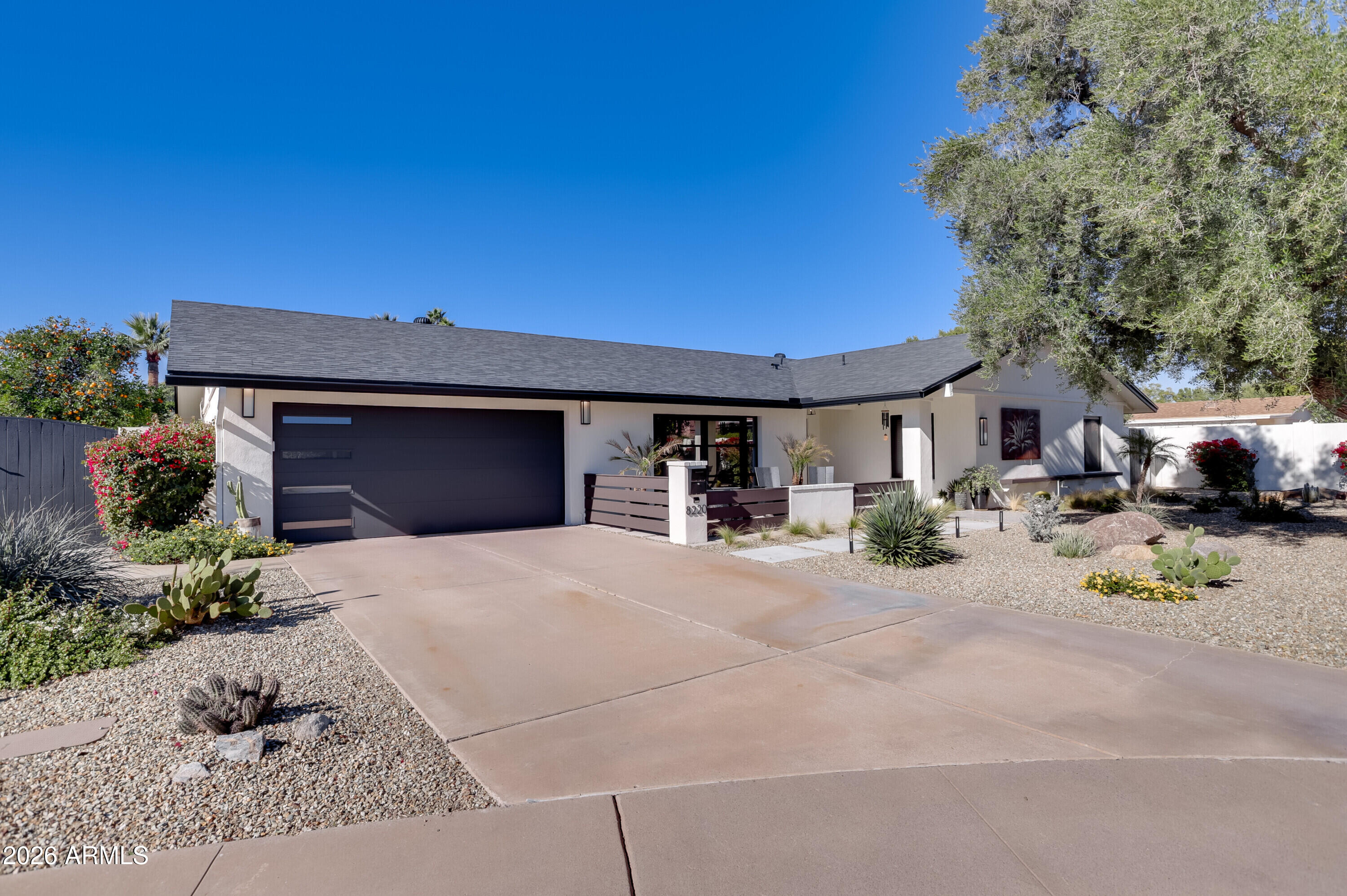 8220 North 1st Avenue Phoenix, AZ 85021 - Photo 3 of 53 a front view of a house with a yard
