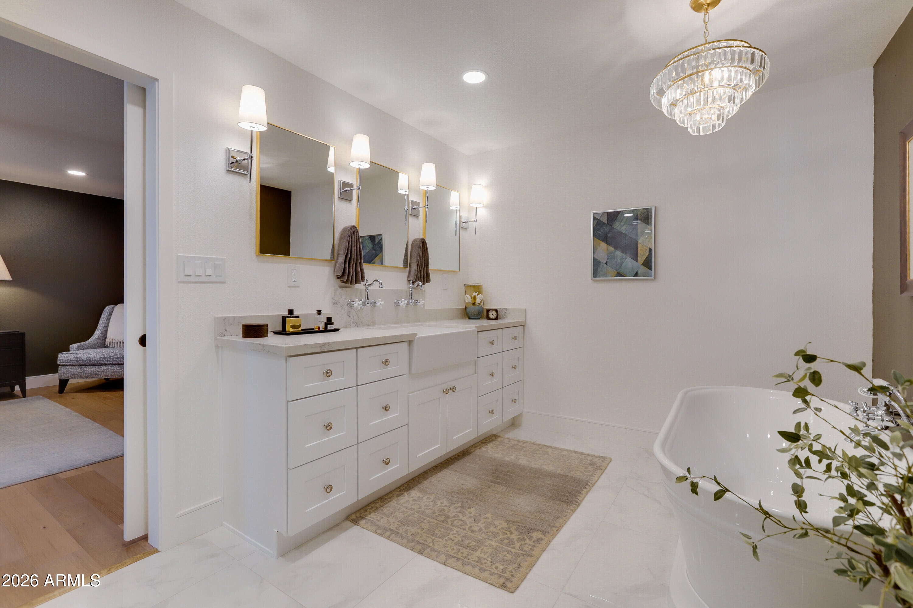 8220 North 1st Avenue Phoenix, AZ 85021 - Photo 37 of 53 a spacious bathroom with a double vanity sink a mirror and a bathtub