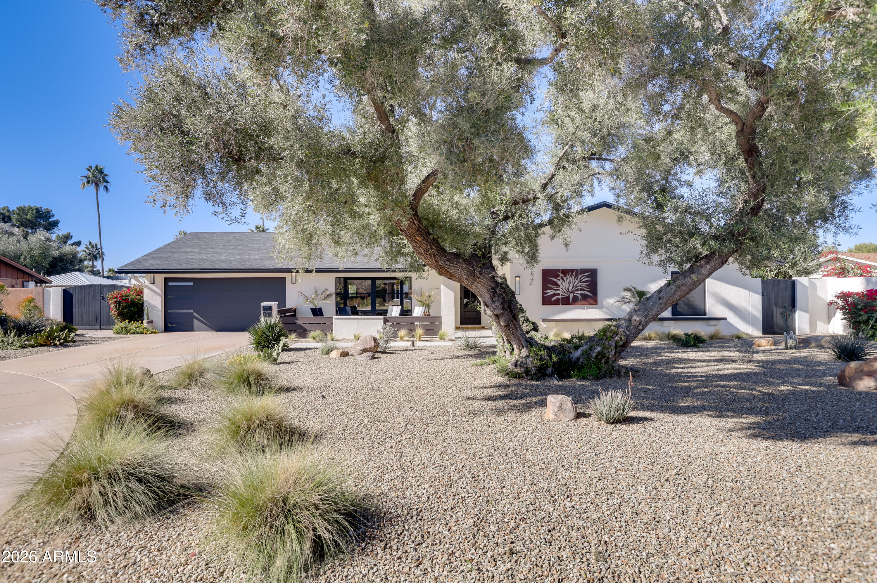 8220 North 1st Avenue Phoenix, AZ 85021 - Photo 4 of 53 a view of a house with a yard