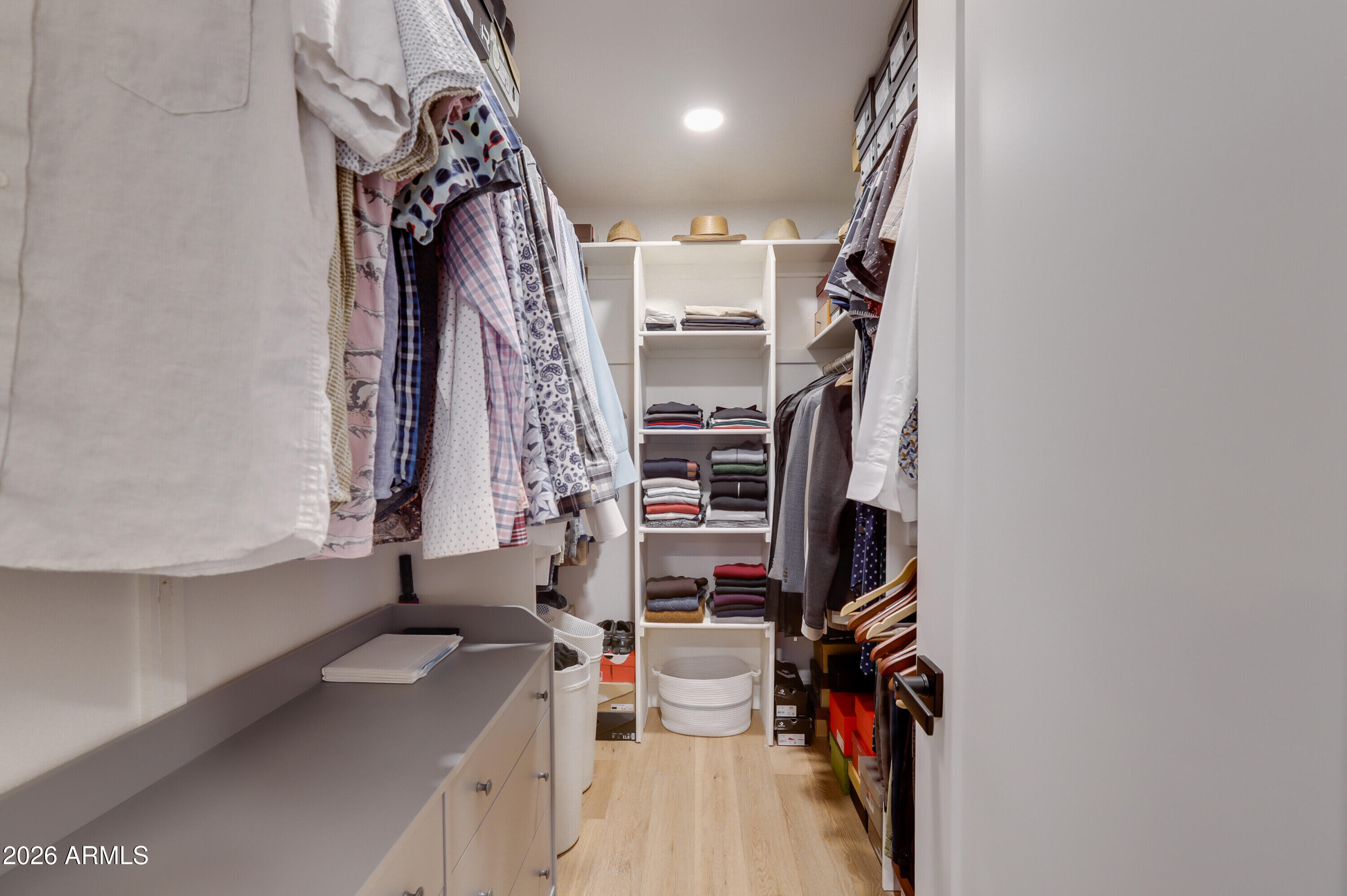 8220 North 1st Avenue Phoenix, AZ 85021 - Photo 46 of 53 a view of walk in closet with clothes and shoes