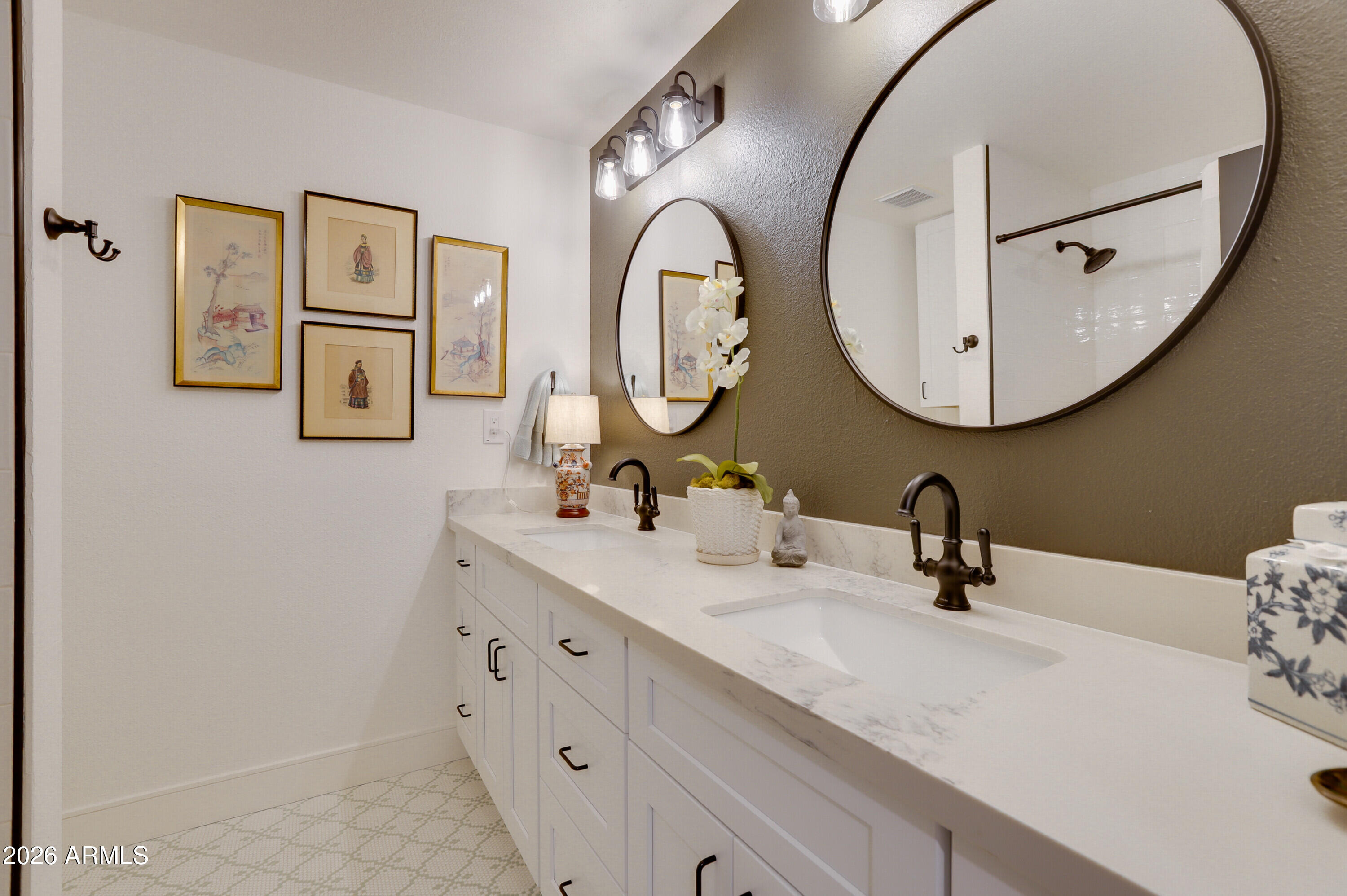 8220 North 1st Avenue Phoenix, AZ 85021 - Photo 47 of 53 a bathroom with a double vanity sink and a mirror