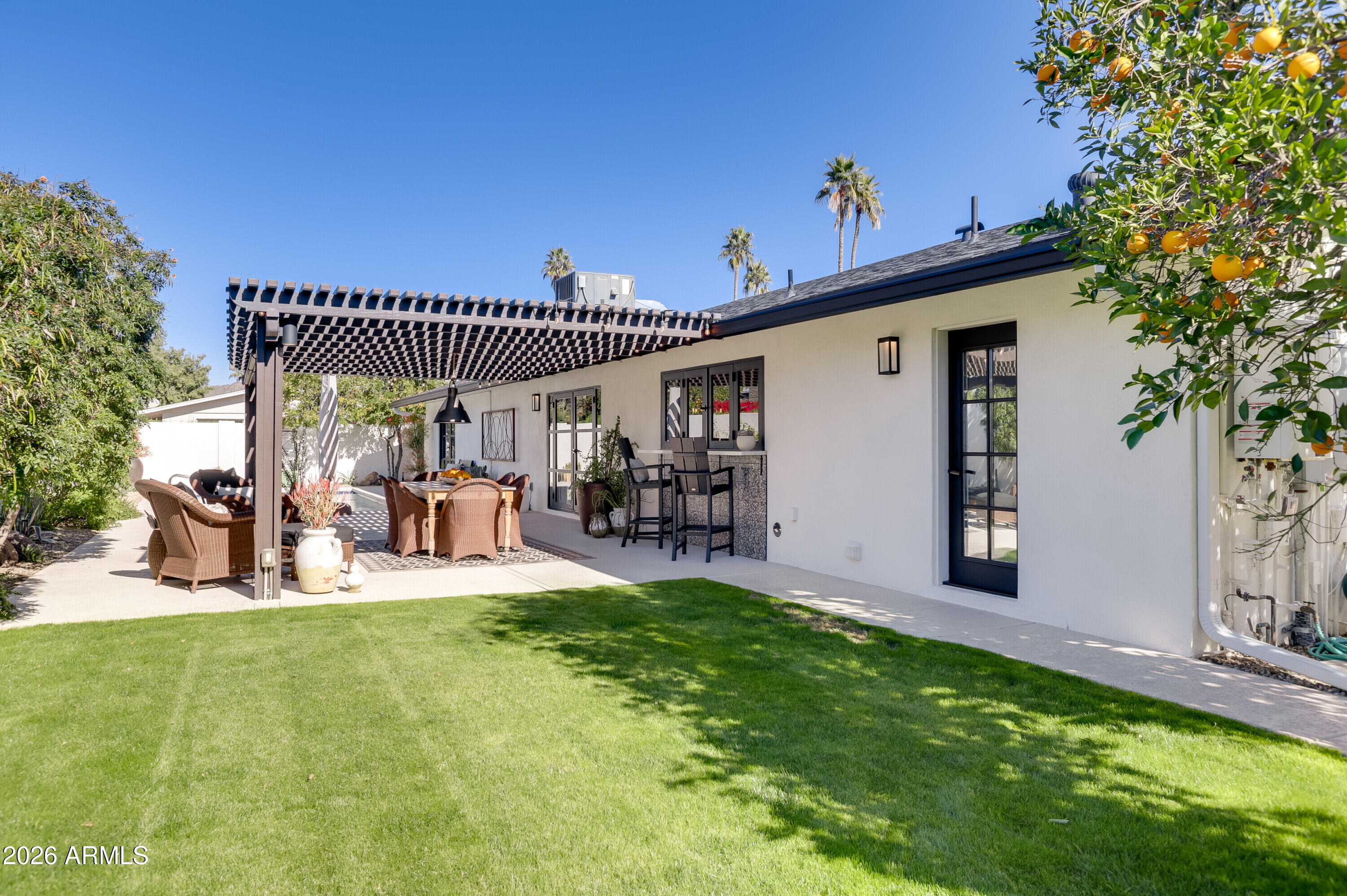 8220 North 1st Avenue Phoenix, AZ 85021 - Photo 50 of 53 a view of a house with a yard porch and sitting area