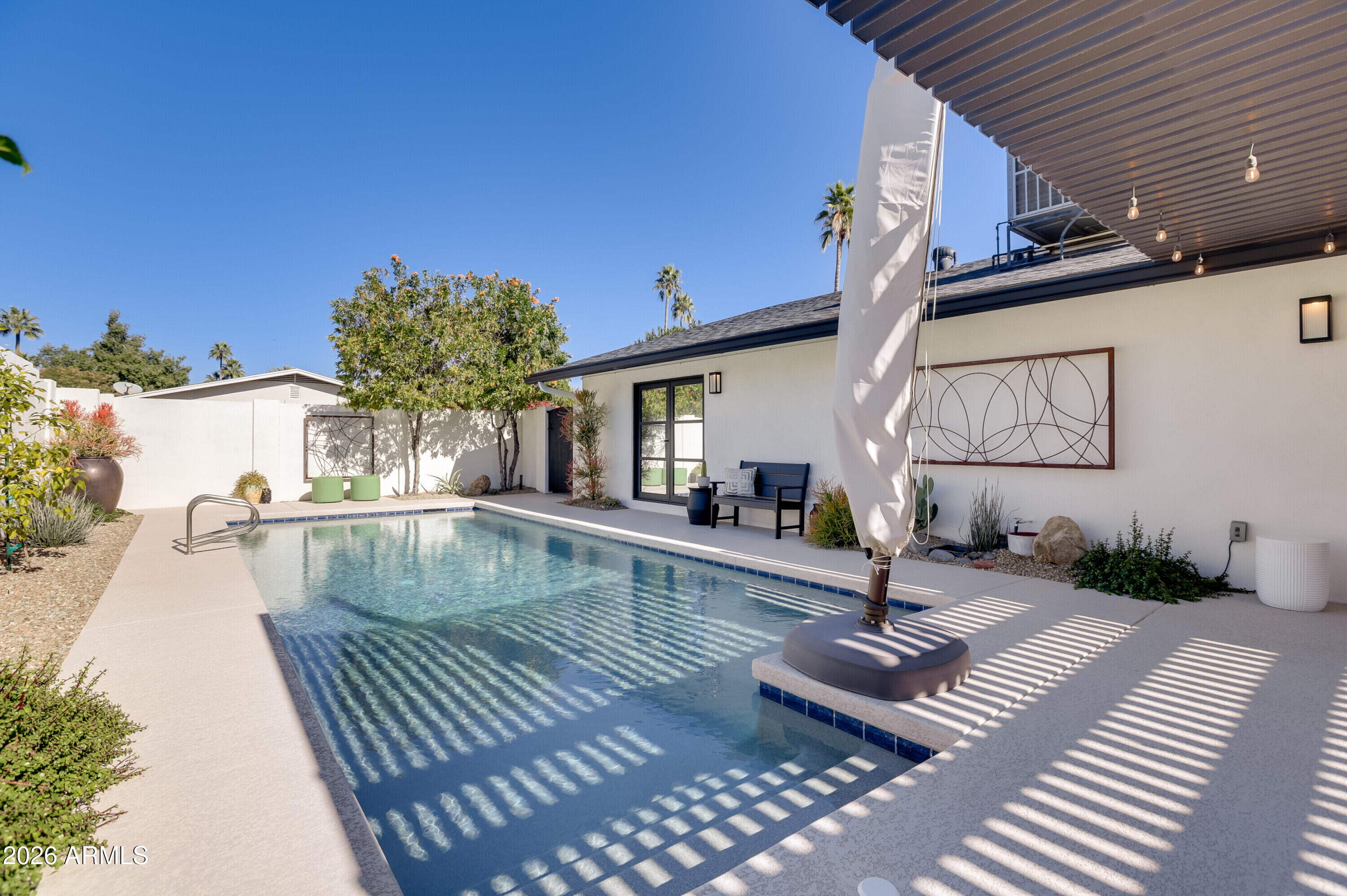 8220 North 1st Avenue Phoenix, AZ 85021 - Photo 51 of 53 a view of swimming pool with outdoor seating