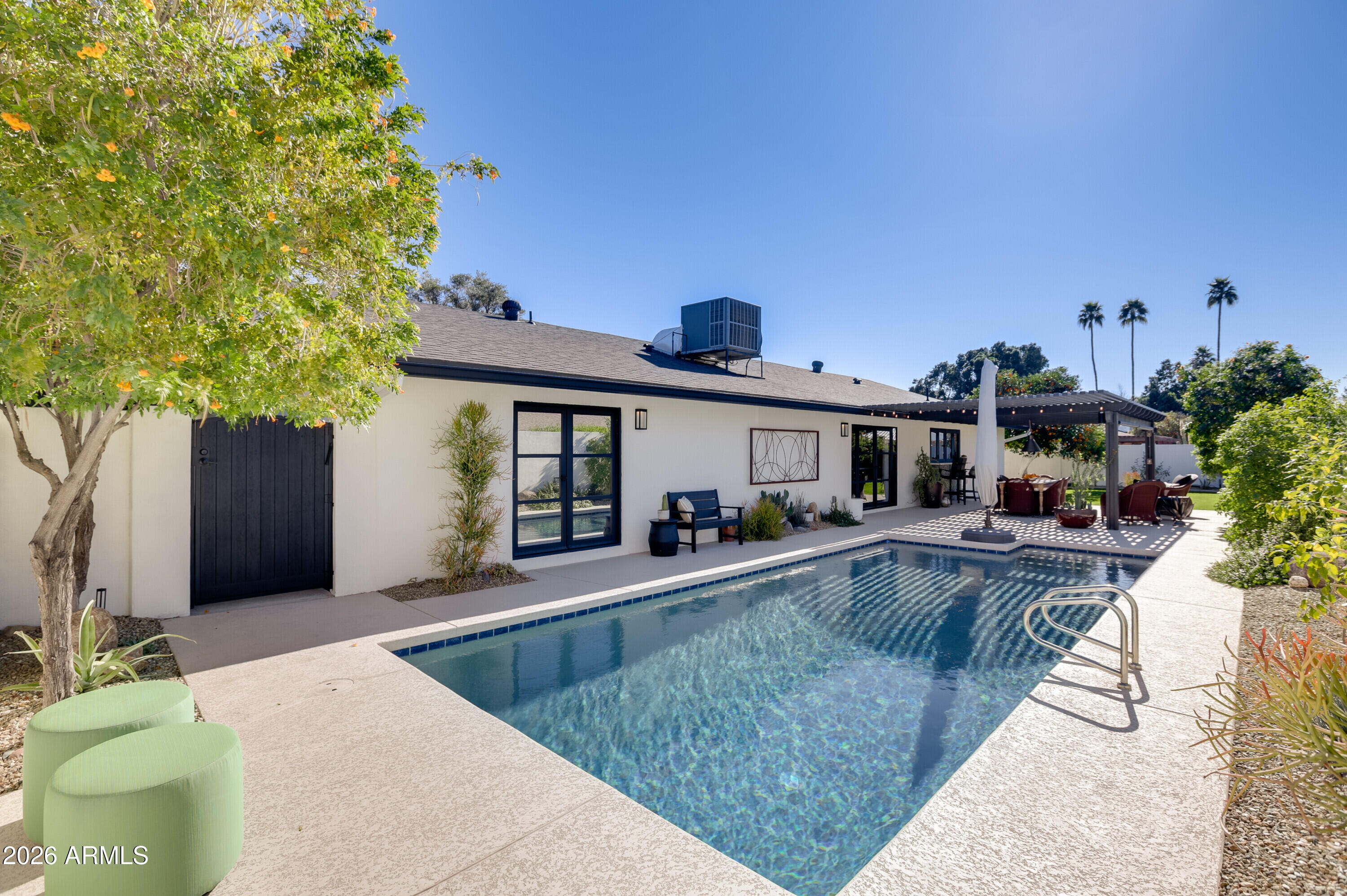 8220 North 1st Avenue Phoenix, AZ 85021 - Photo 53 of 53 a view of a house with swimming pool and sitting area