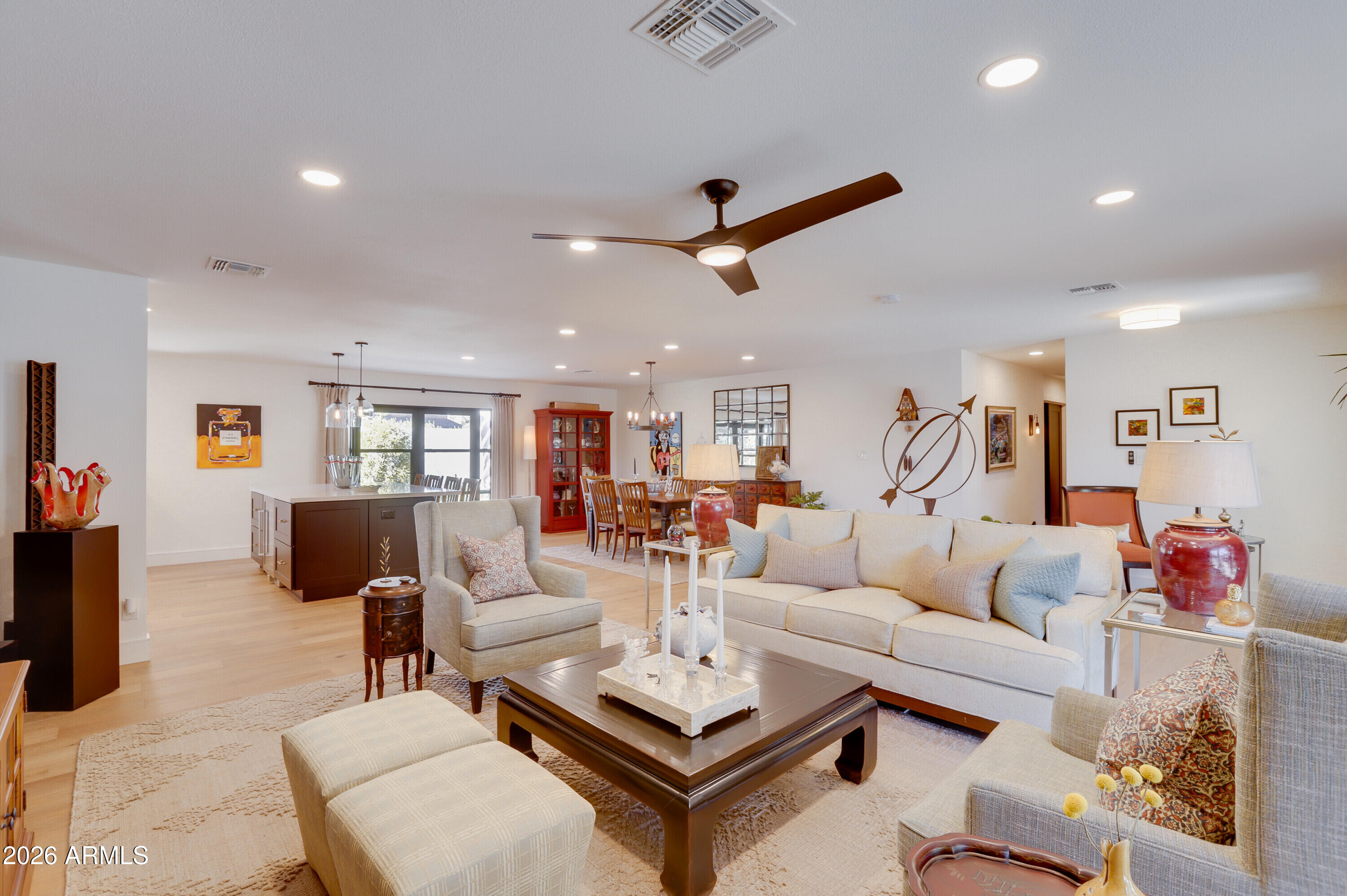 8220 North 1st Avenue Phoenix, AZ 85021 - Photo 10 of 53 a living room with furniture and a flat screen tv