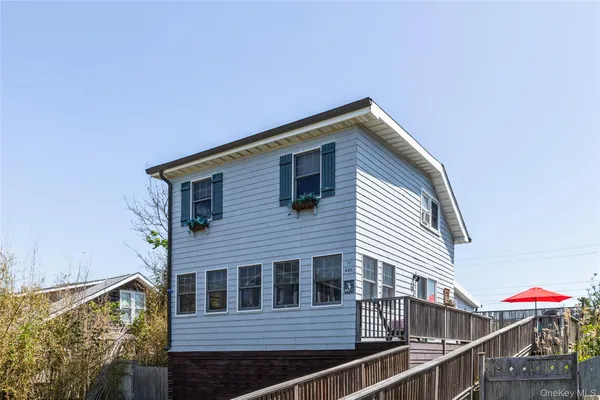 a view of house with balcony