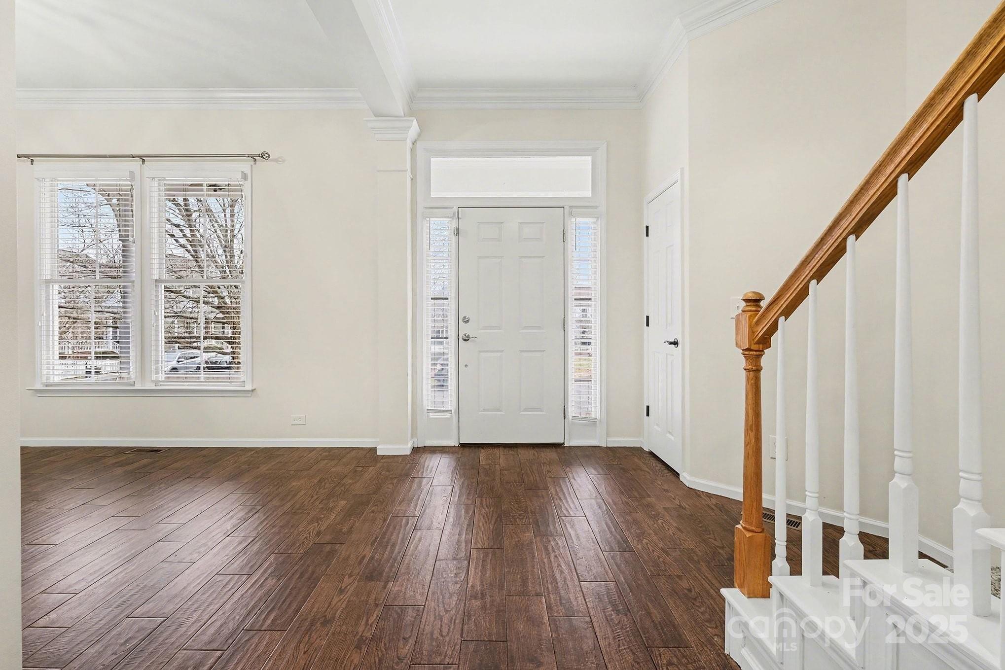 138 Blandina Court Fort Mill, SC 29708 - Photo 5 of 41 an empty room with wooden floor and entryway