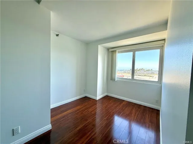 a view of a swimming pool with a table and chairs