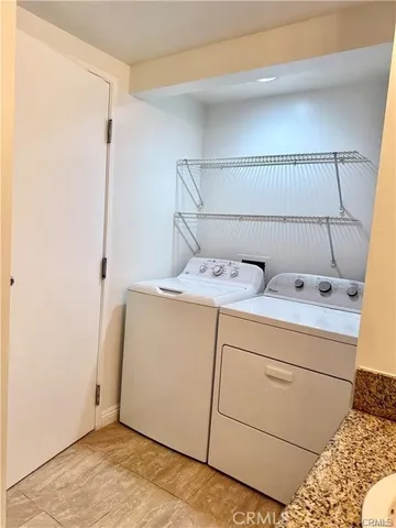 a outdoor living space with furniture and a potted plant