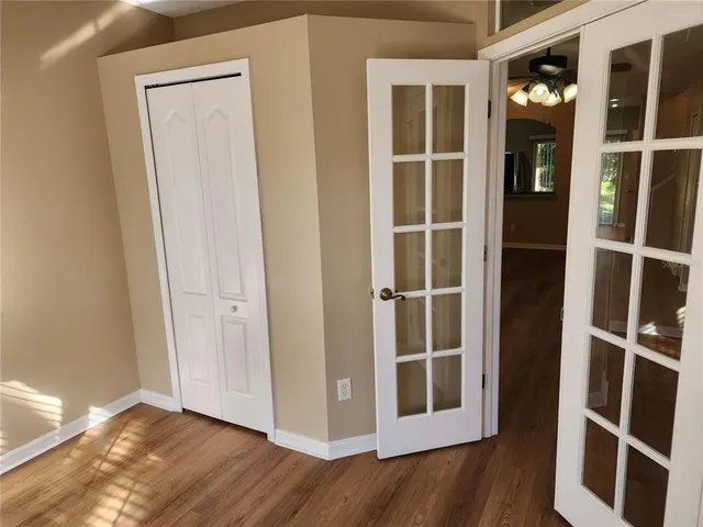 a view of walk in closet with empty tub