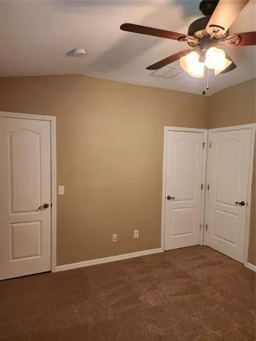 a bathroom with a sink toilet and a mirror