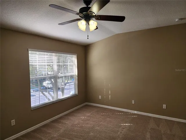 an empty room with sliding door