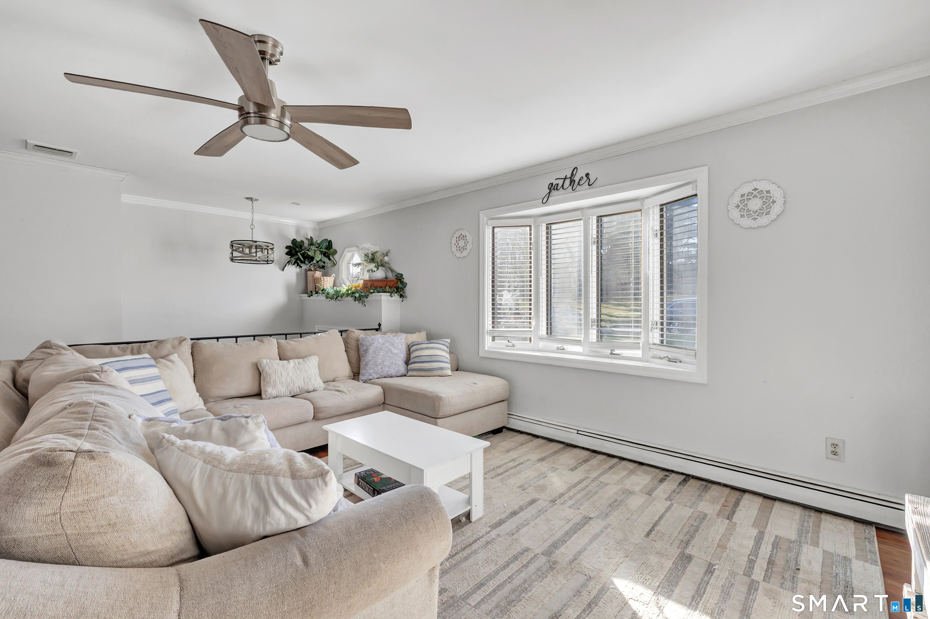 32 Autumn Ridge Road Milford, CT 06461 - Photo 14 of 40 a living room with furniture and a window