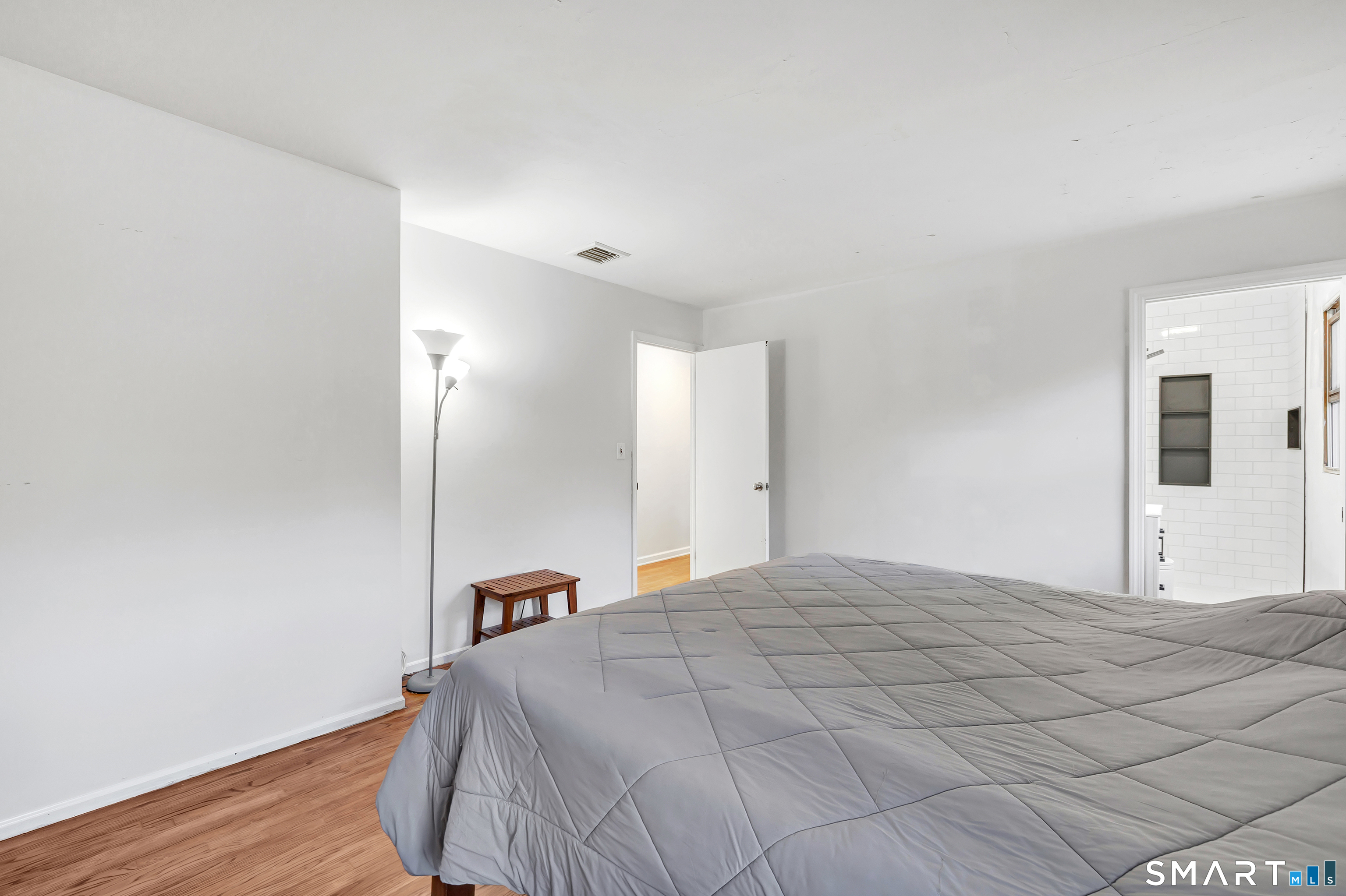 32 Autumn Ridge Road Milford, CT 06461 - Photo 20 of 40 a large white bed in a white room