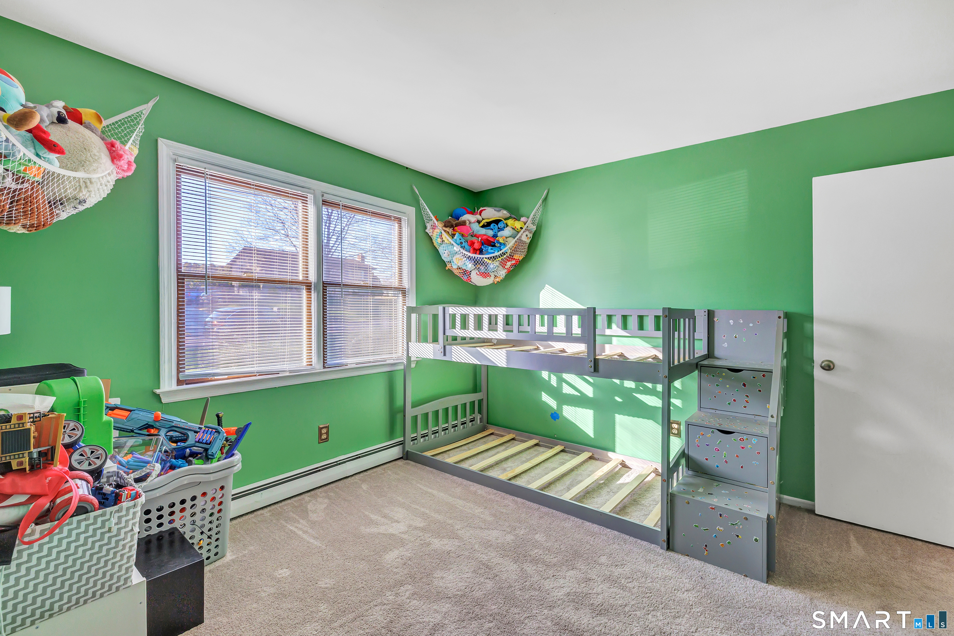 32 Autumn Ridge Road Milford, CT 06461 - Photo 24 of 40 a green field with flowers