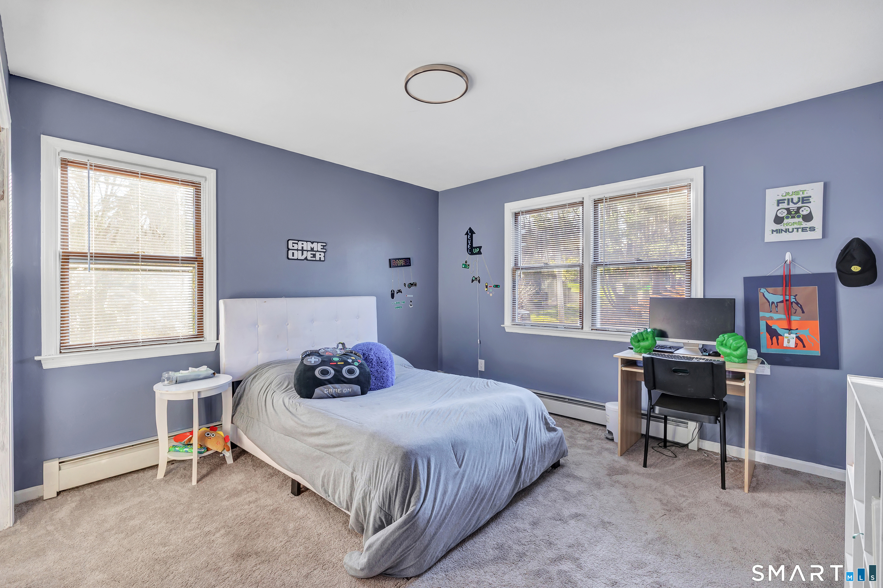 32 Autumn Ridge Road Milford, CT 06461 - Photo 26 of 40 a bedroom with a bed and a window