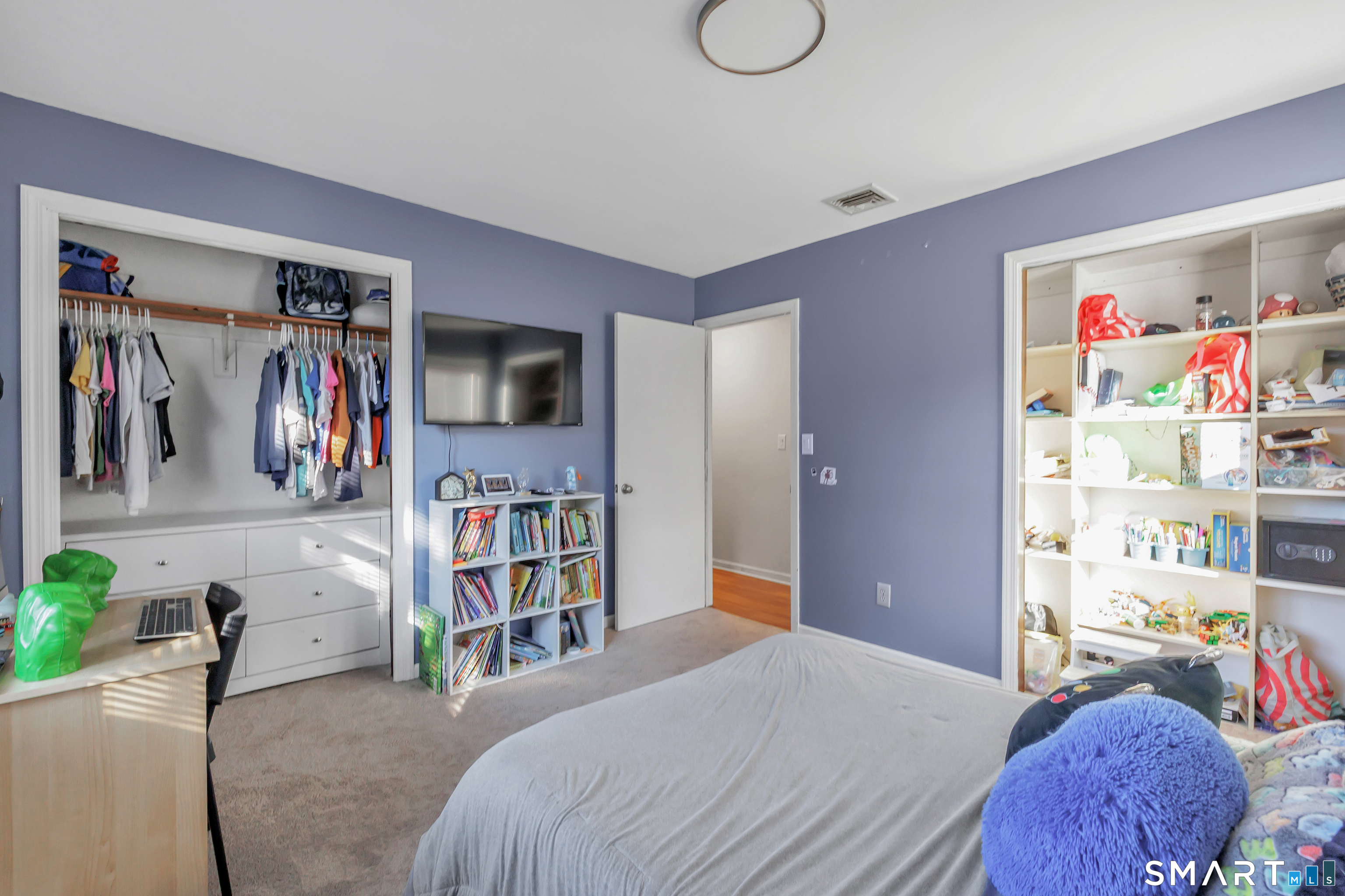 32 Autumn Ridge Road Milford, CT 06461 - Photo 27 of 40 a bedroom with a bed and closet