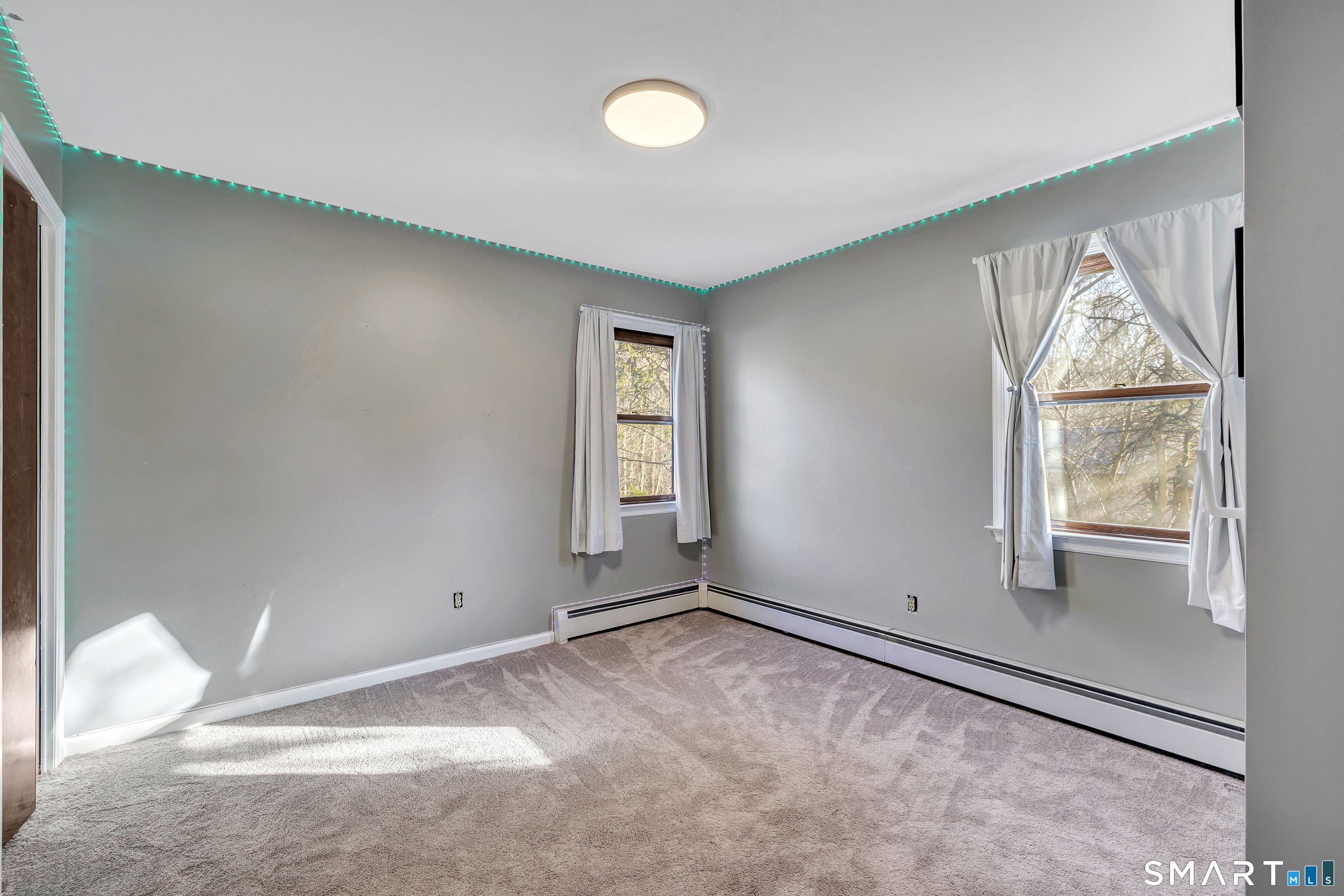 32 Autumn Ridge Road Milford, CT 06461 - Photo 28 of 40 an empty room with windows