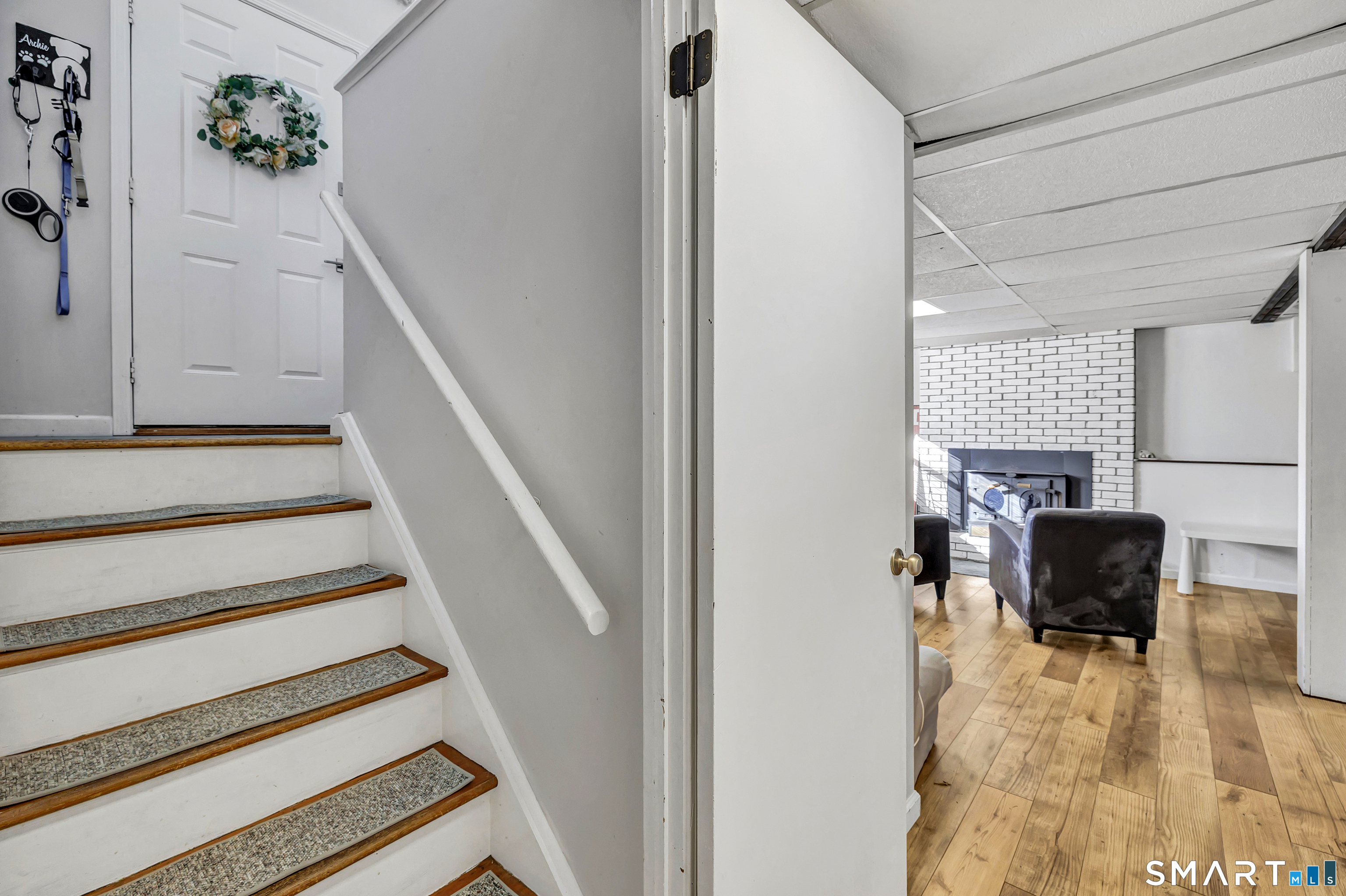 32 Autumn Ridge Road Milford, CT 06461 - Photo 31 of 40 a view of entryway and hall with wooden floor