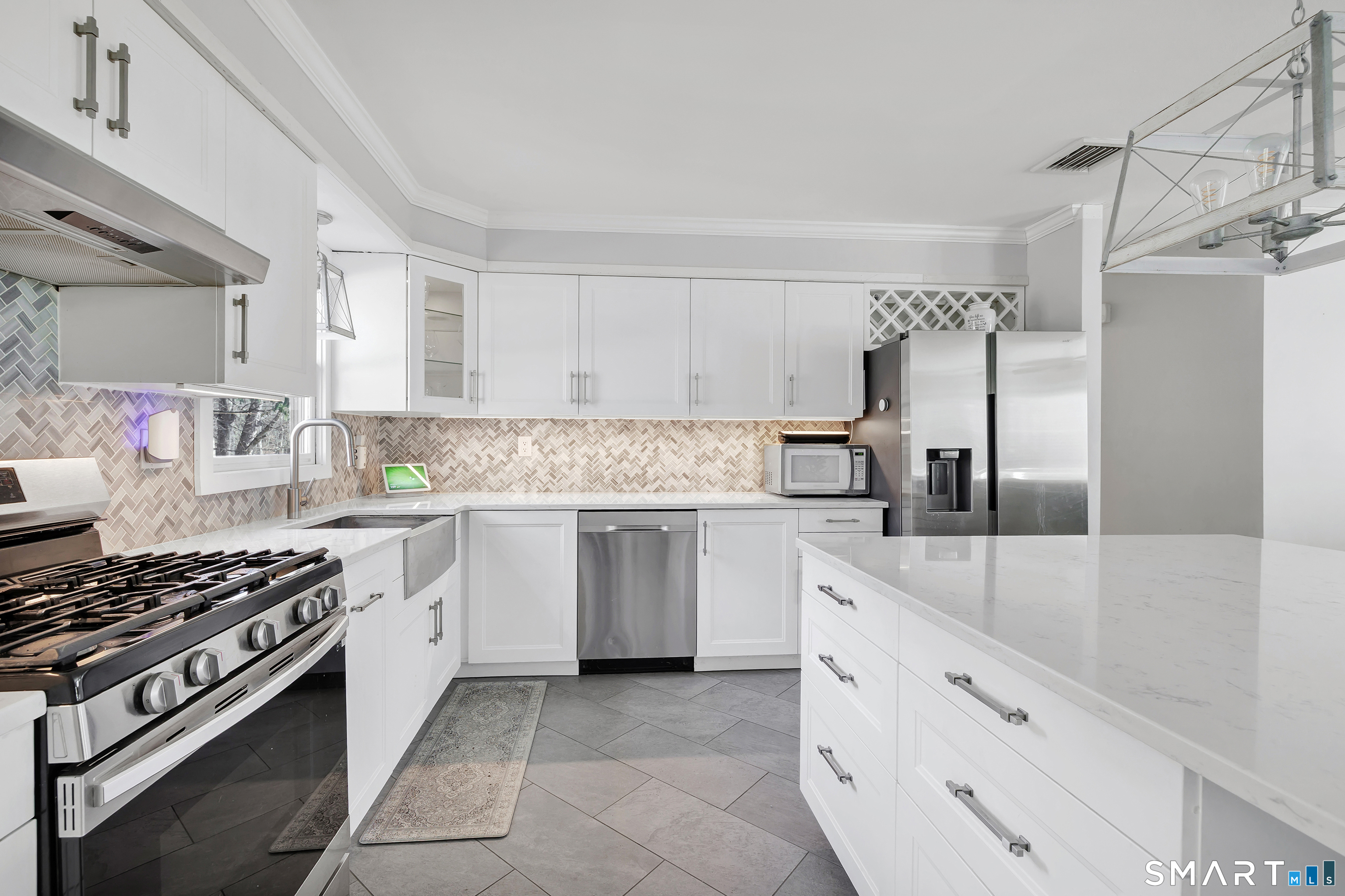 32 Autumn Ridge Road Milford, CT 06461 - Photo 9 of 40 a kitchen with granite countertop cabinets and stainless steel appliances