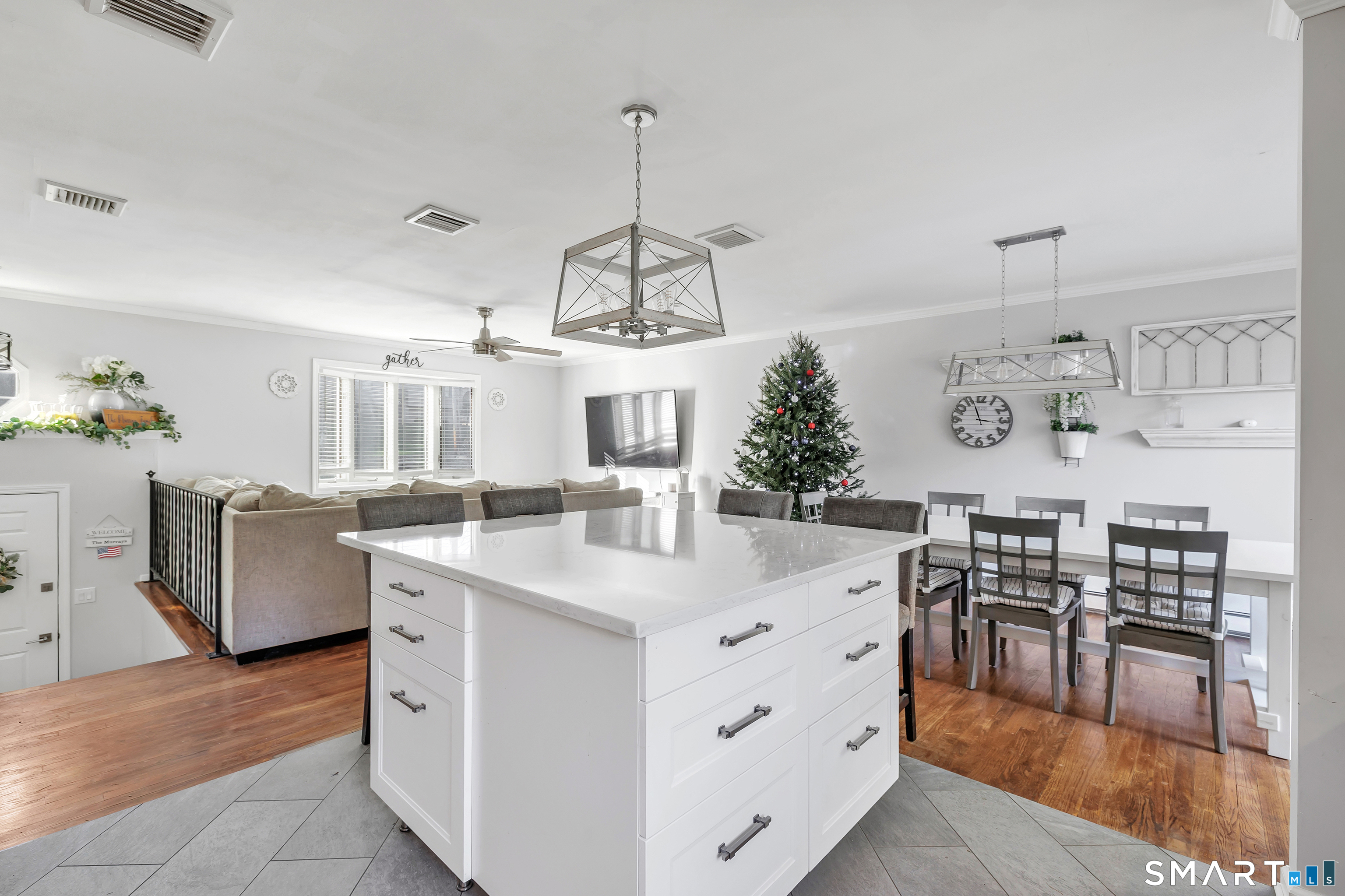32 Autumn Ridge Road Milford, CT 06461 - Photo 10 of 40 a kitchen with cabinets a counter and chairs