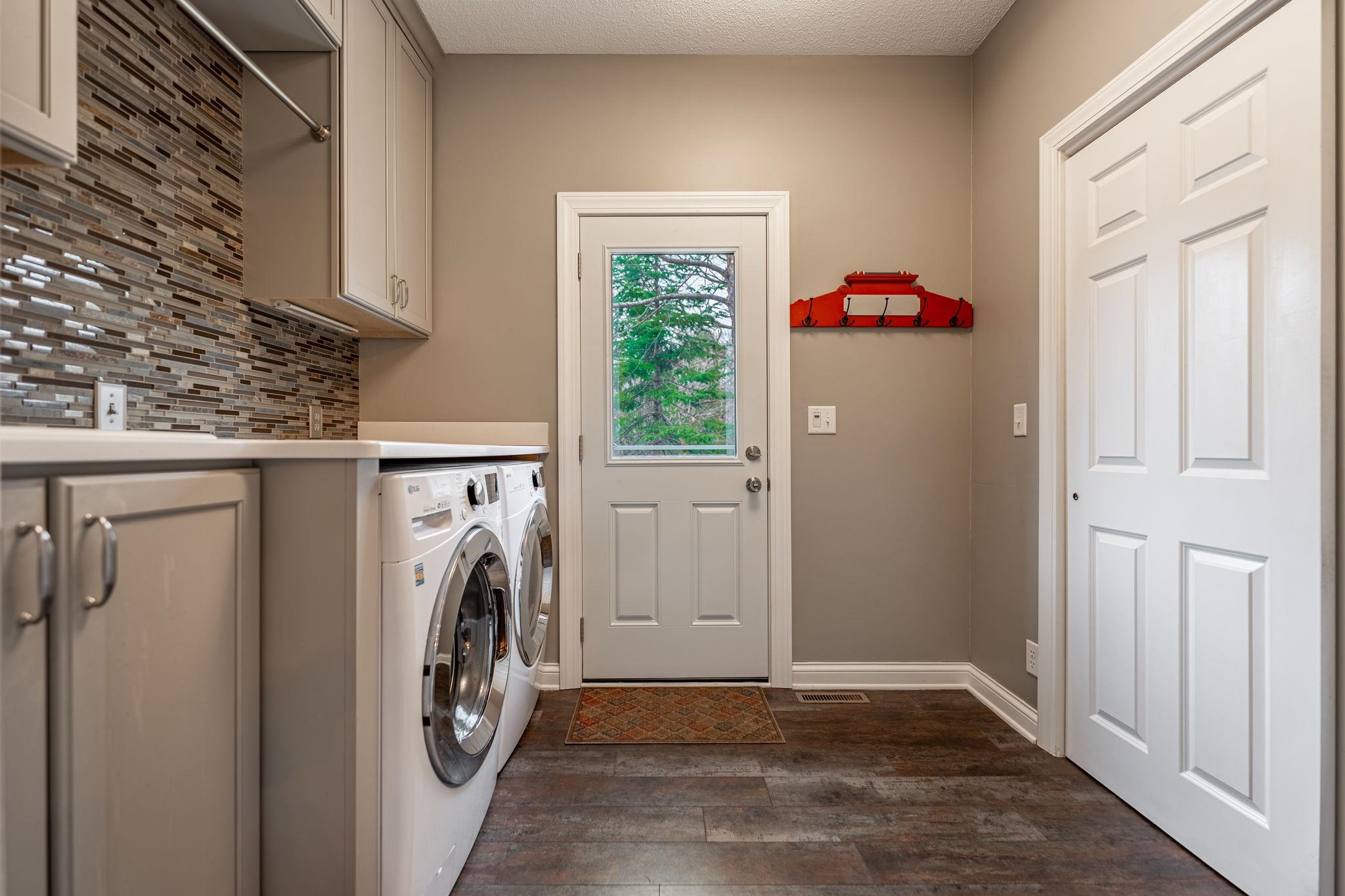8161 Killarney Aire Road Roscoe, IL 61073 - Photo 19 of 53 a utility room with dryer and washer